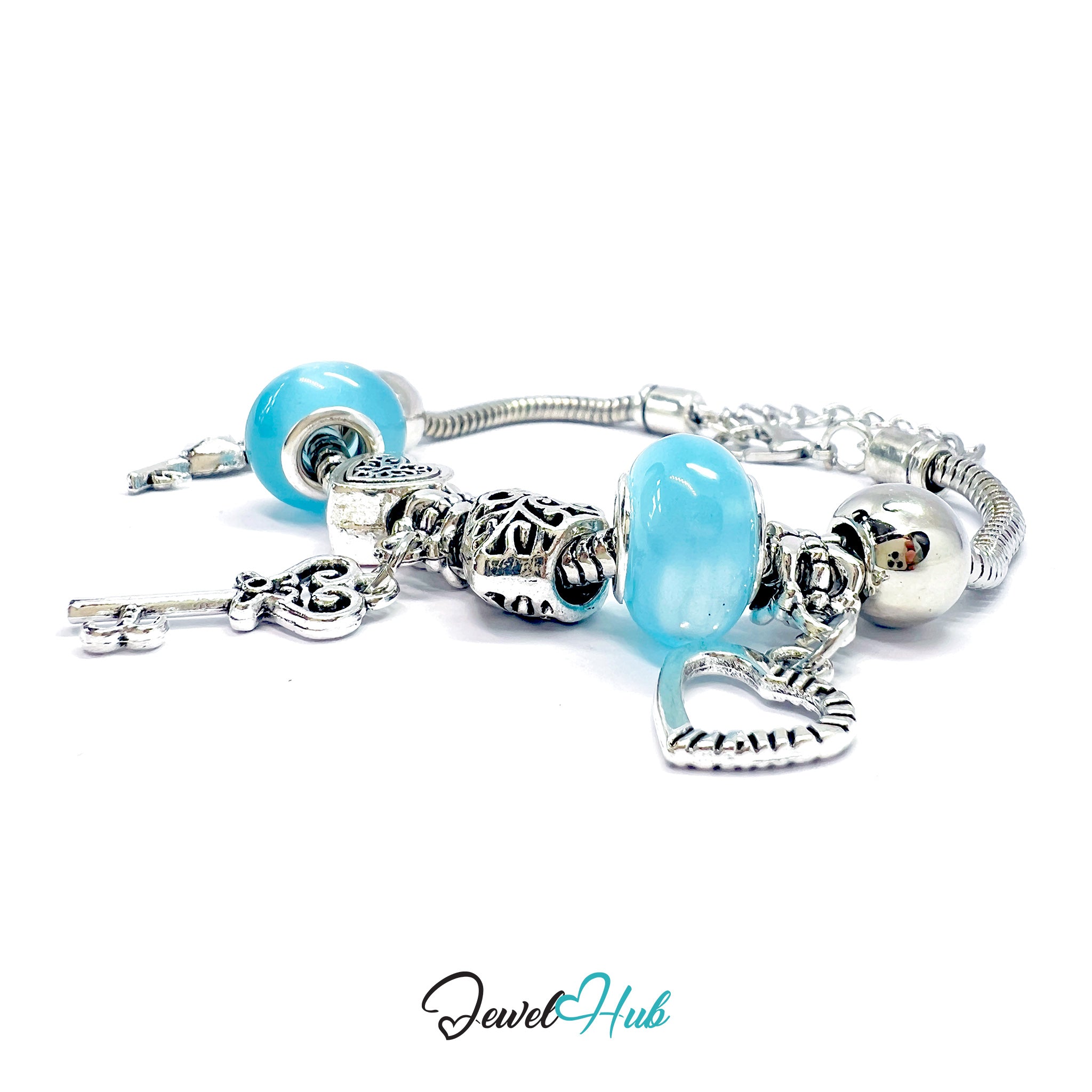 Silver bracelet with blue beads on a white background, branded 'Jewel Hub'.