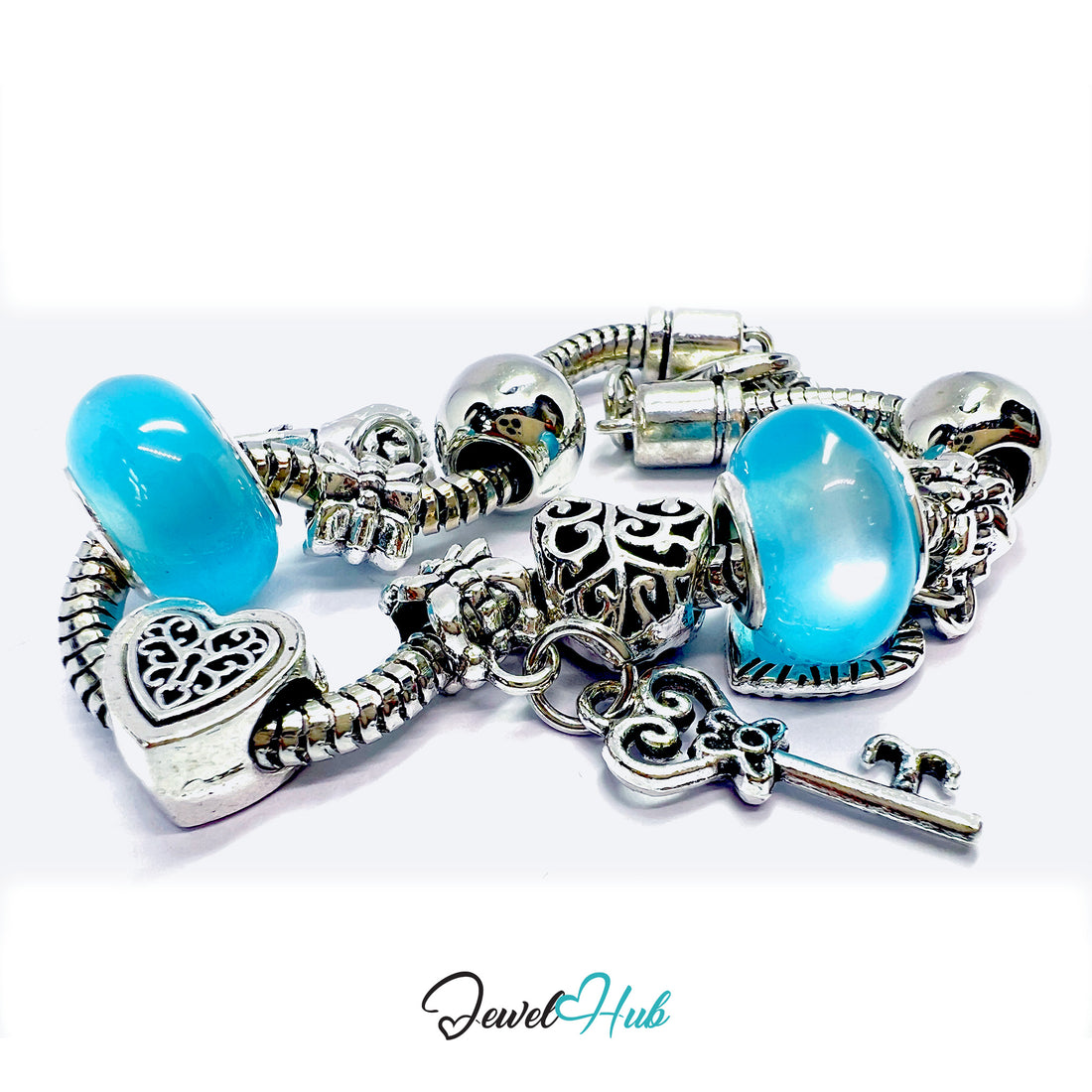 Bracelet with blue beads and silver charms on a white background, branded 'Jewel Hub'.