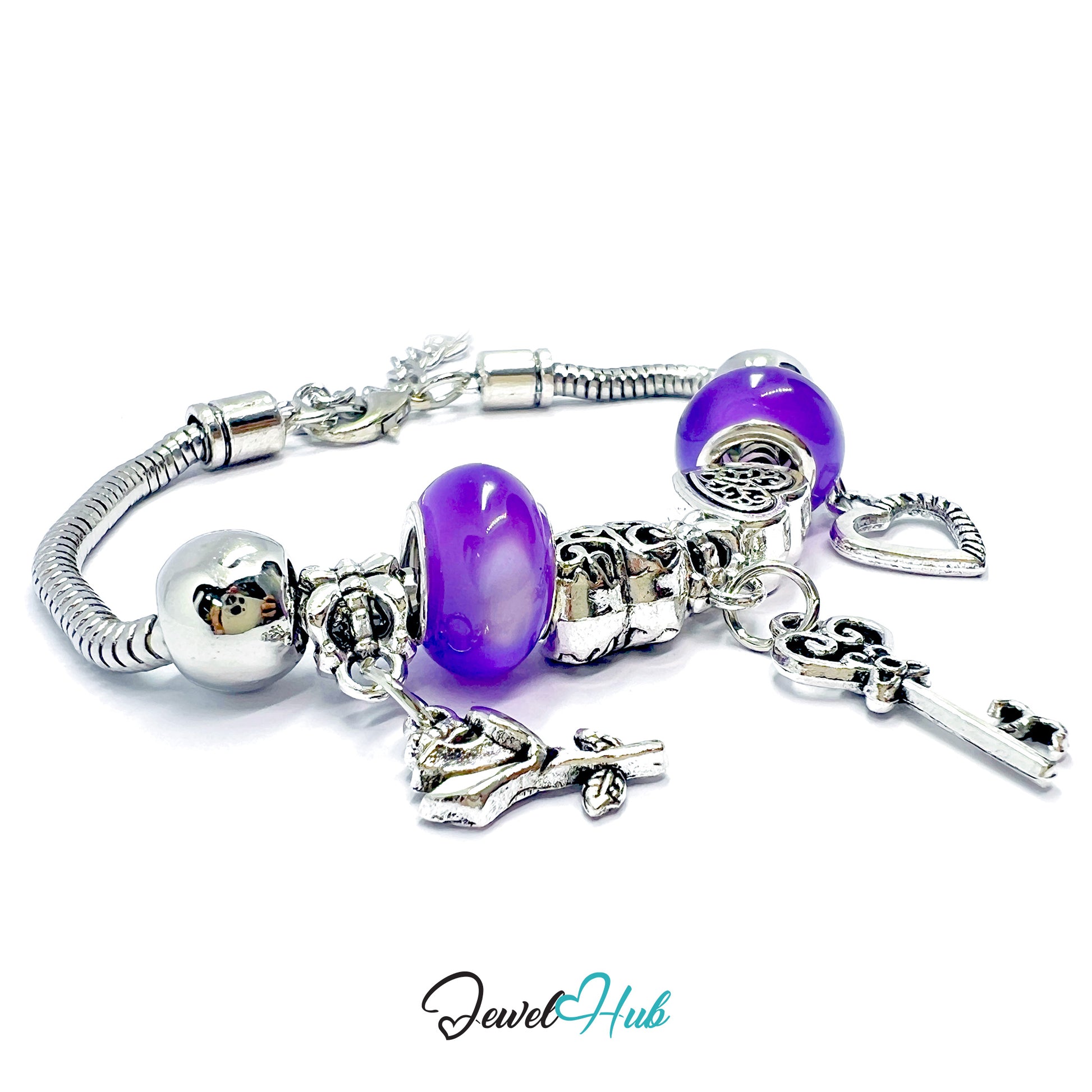 Silver bracelet with purple charms on a white background, branded 'Jewel Hub'.