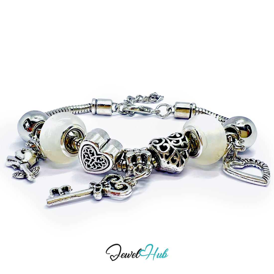 Silver charm bracelet with heart, key, and round beads on a white background, branded 'Jewel Hub'.