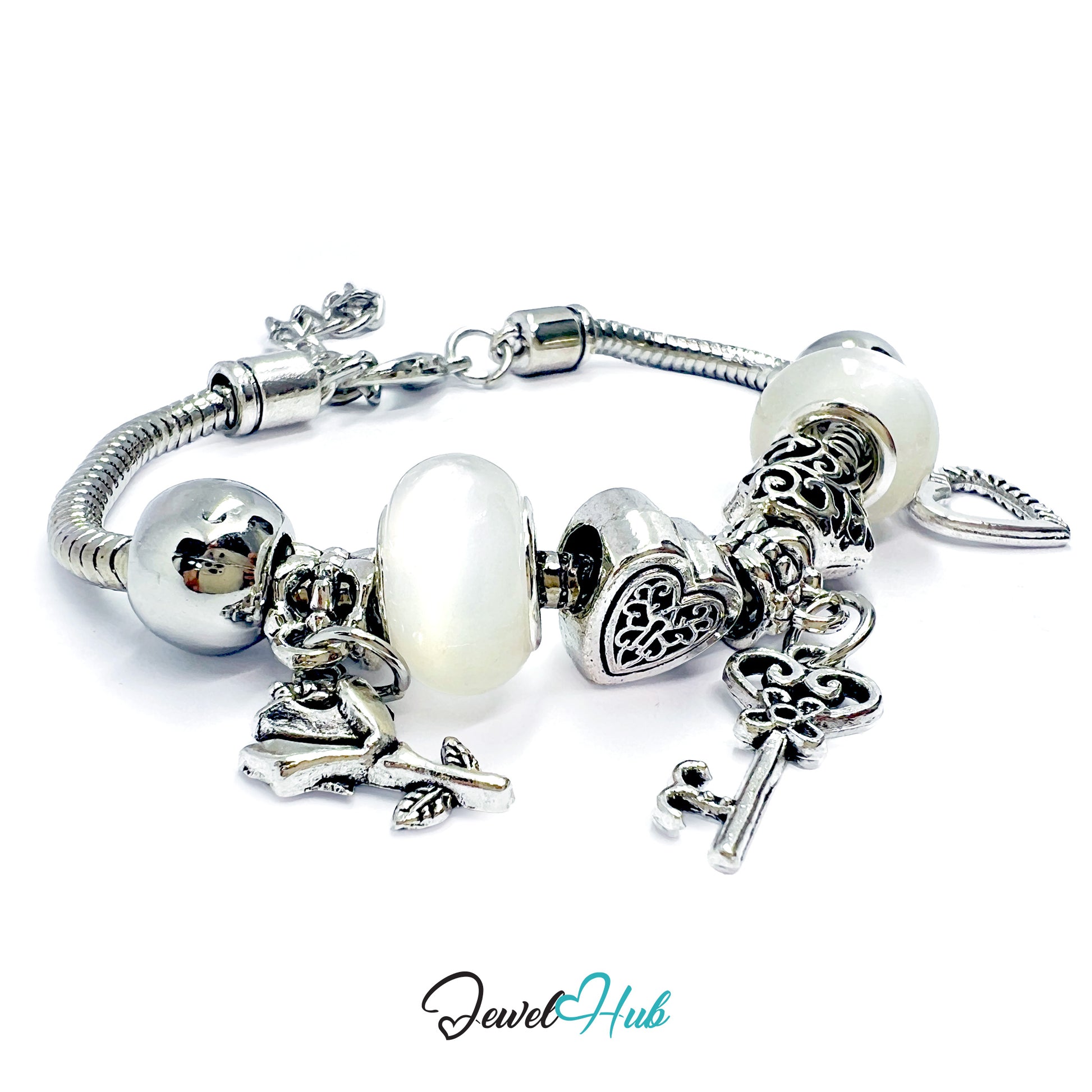 Silver bracelet with various charms on a white background, branded 'Jewel Hub'.