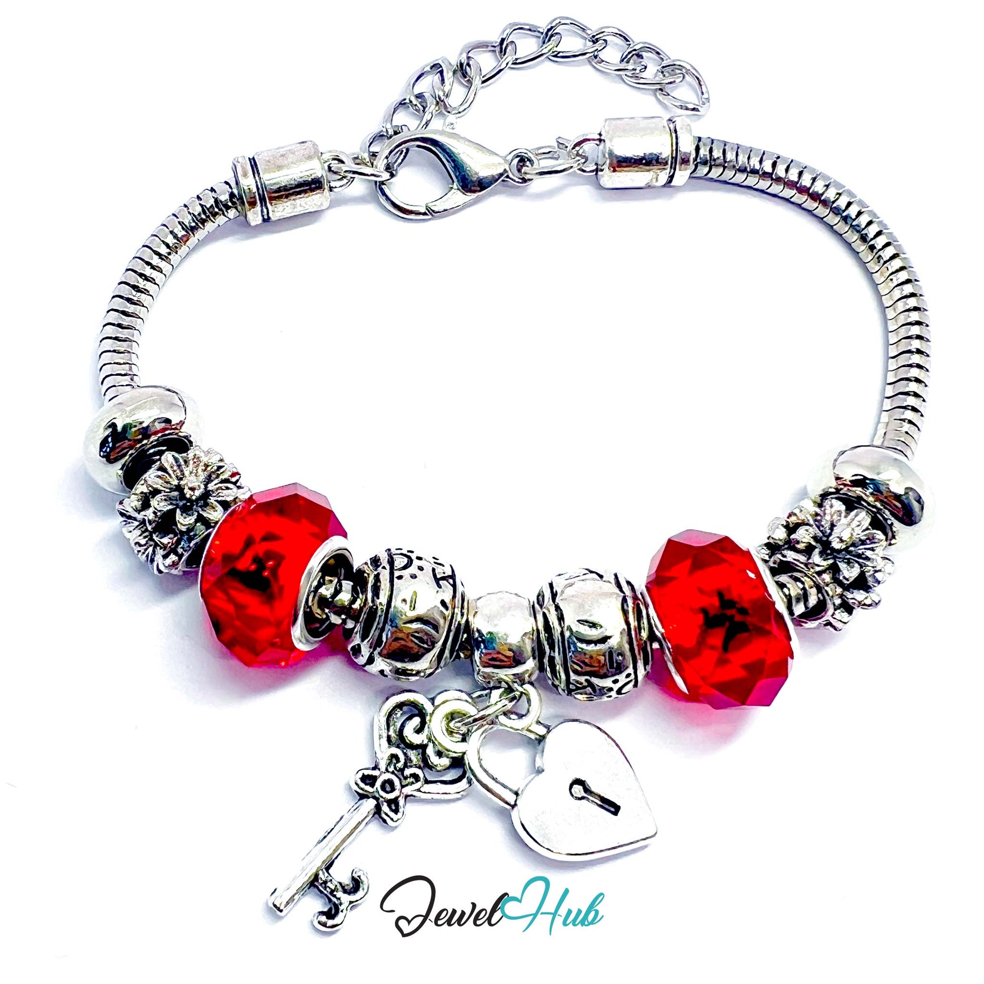 Silver bracelet with red beads and a heart lock charm on a white background, branded 'Jewel Hub'.