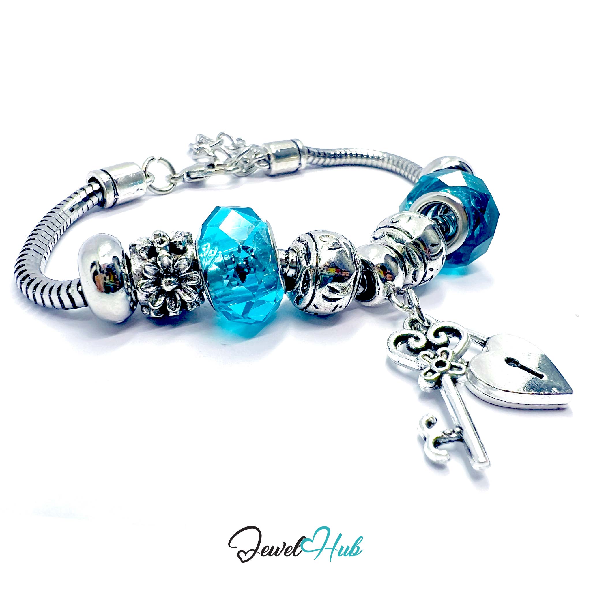 Silver bracelet with blue beads and a heart-shaped charm on a white background, branded 'Jewel Hub'.