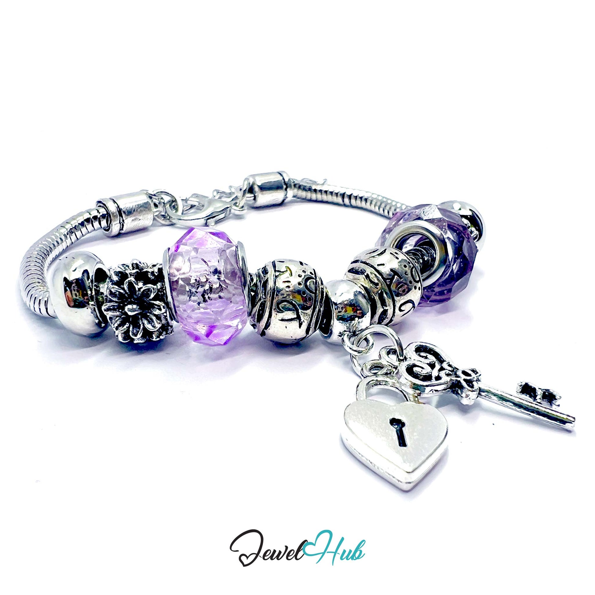 Silver bracelet with purple beads and heart-shaped lock charm on a white background, branded 'Jewel Hub'.