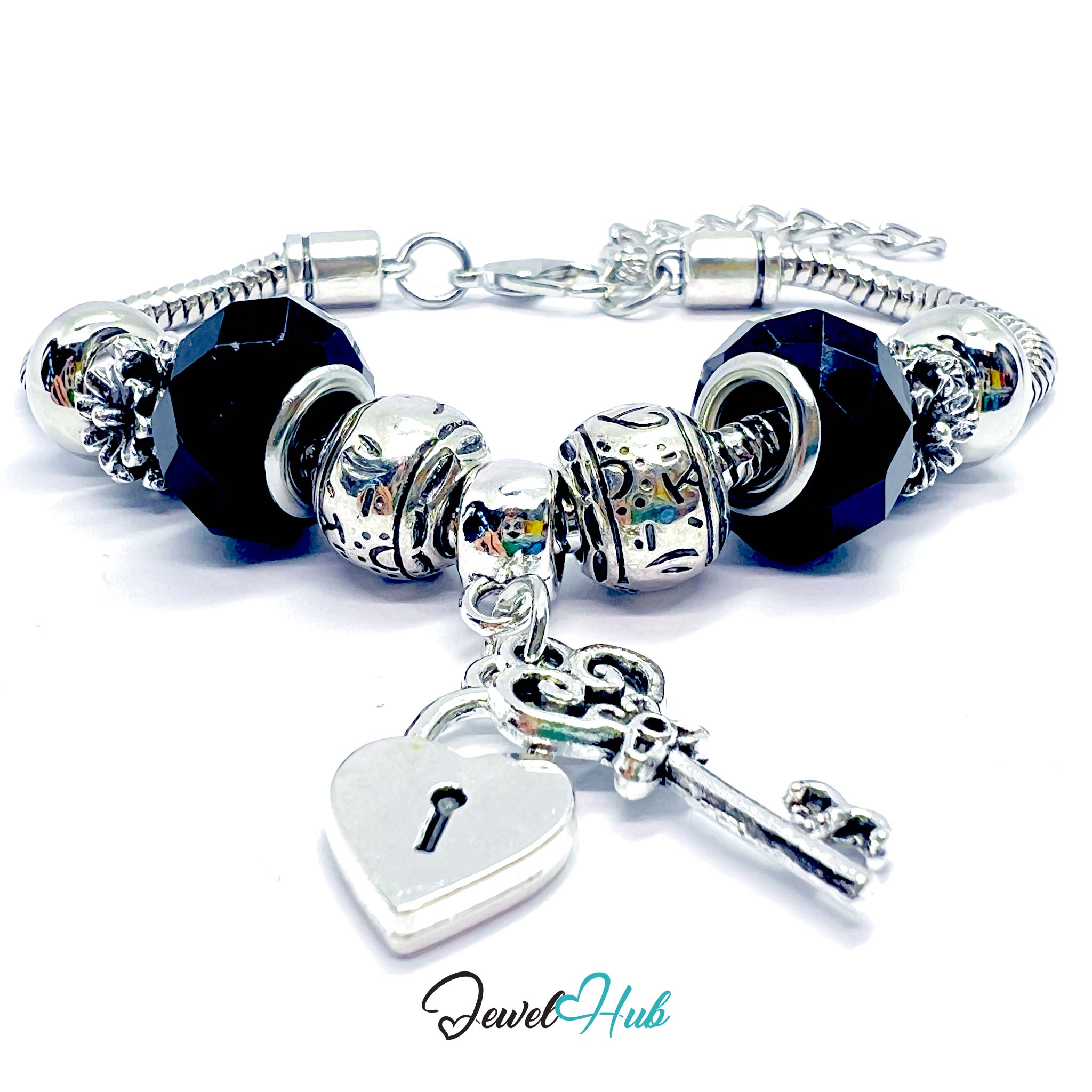 Silver bracelet with blue beads and key charm on a white background, branded 'Jewel Hub'.