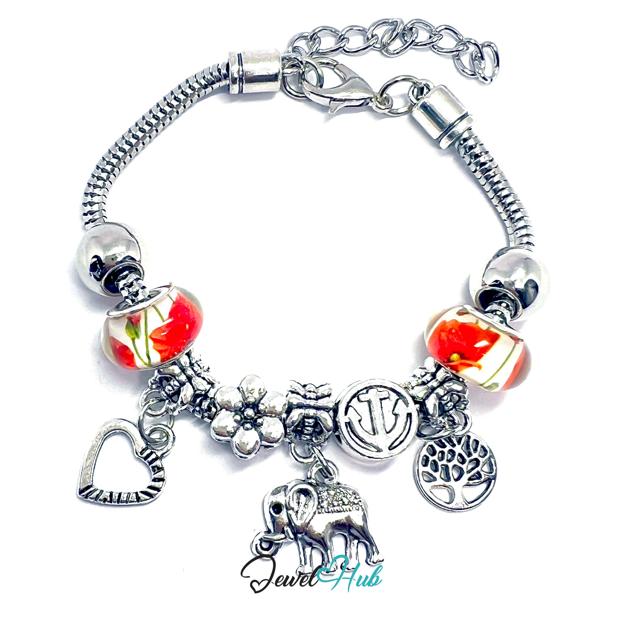 Silver charm bracelet with various charms on a white background