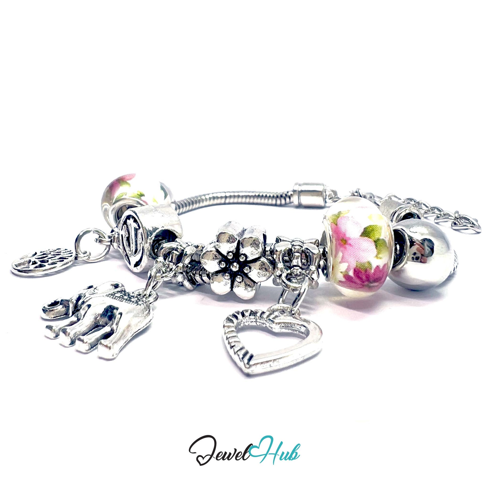 Silver charm bracelet with various charms on a white background, branded 'Jewel Hub'.