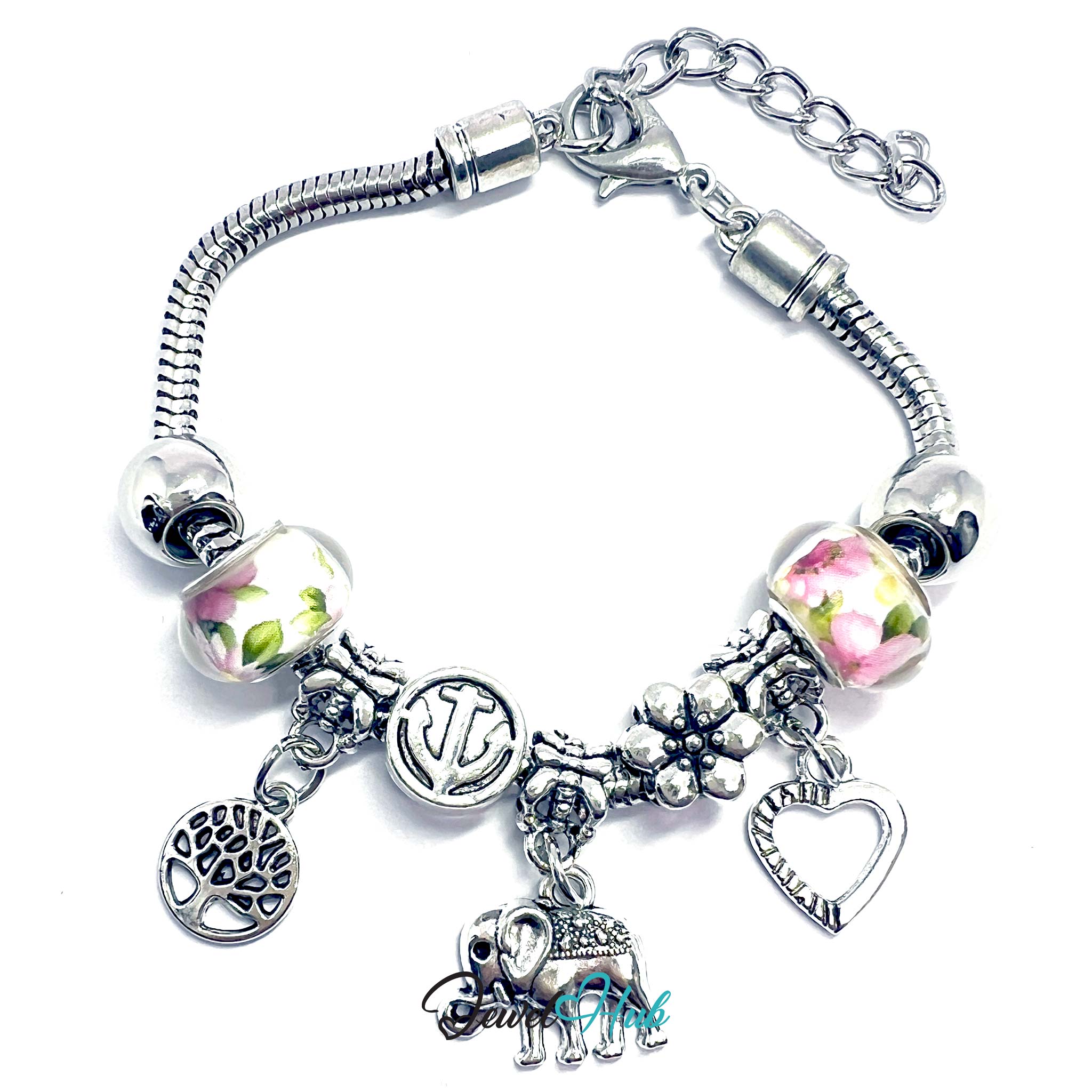 Silver bracelet with various charms on a white background