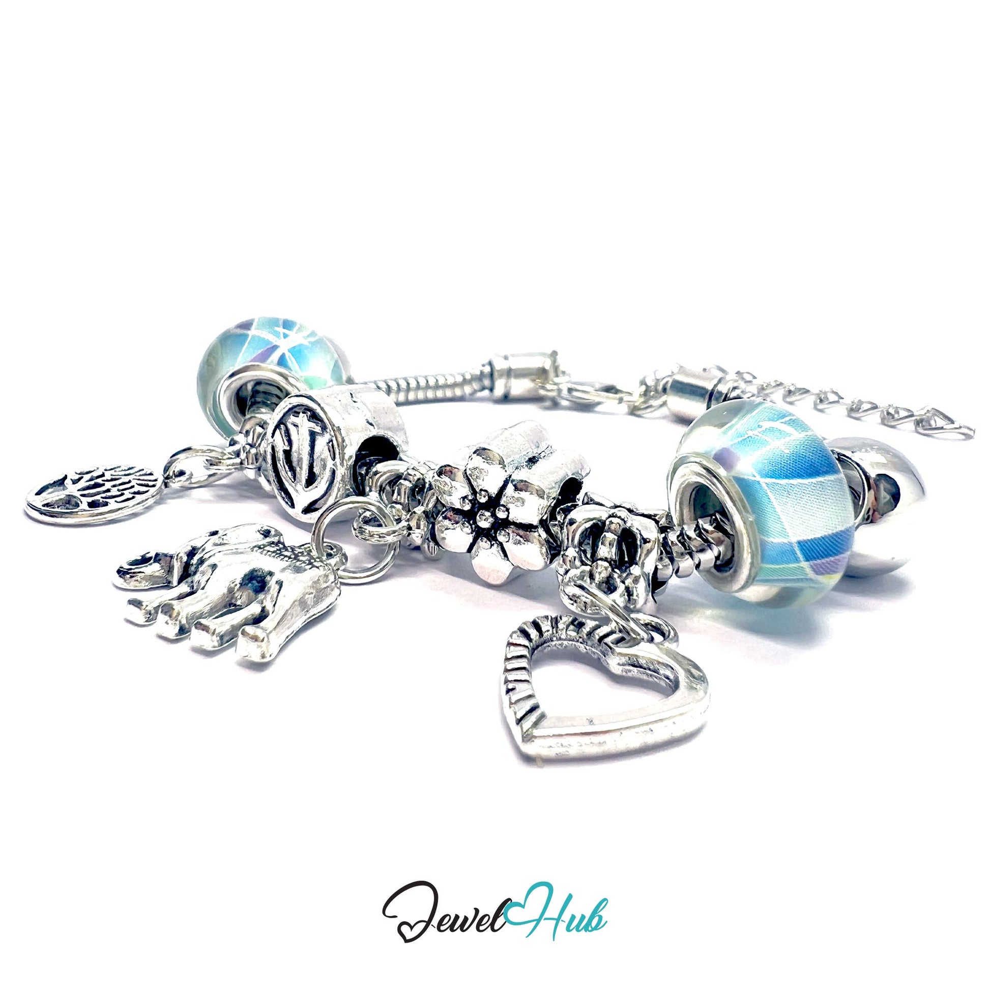 Silver charm bracelet with various charms on a white background, branded 'Jewel Hub'.