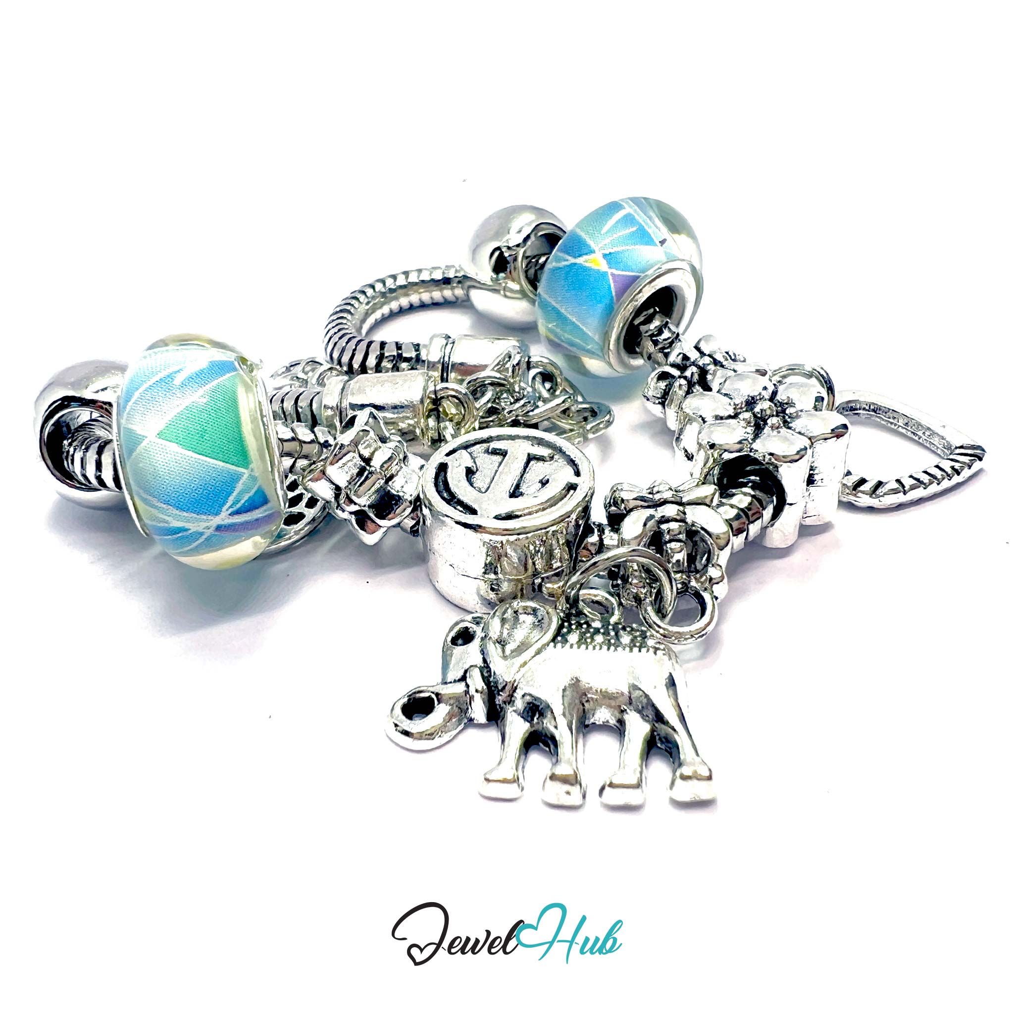 Silver charm bracelet with various charms on a white background, branded 'Jewel Hub'.