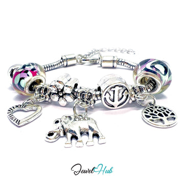 Silver charm bracelet with various charms on a white background, branded 'Jewel Hub'.