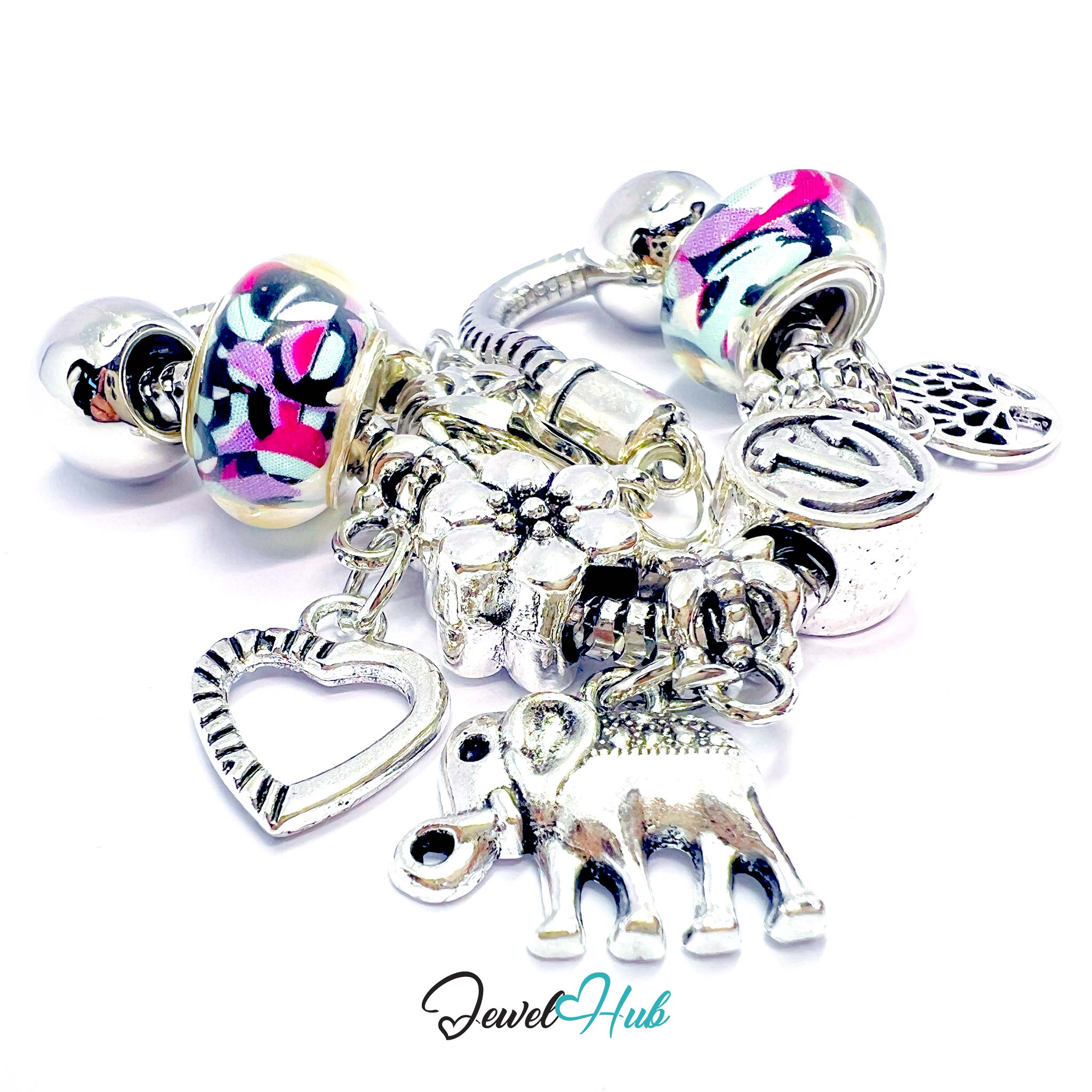 Silver charm bracelet with various charms on a white background, featuring the brand 'Jewel Hub'.