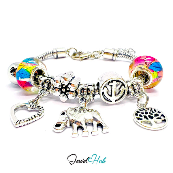 Multicolored charm bracelet with various charms on a white background, branded 'Jewel Hub'.