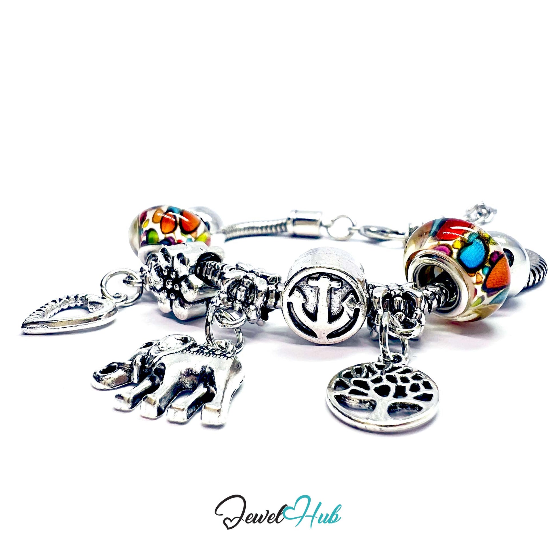 Silver charm bracelet with various charms on a white background, branded 'Jewel Hub'.