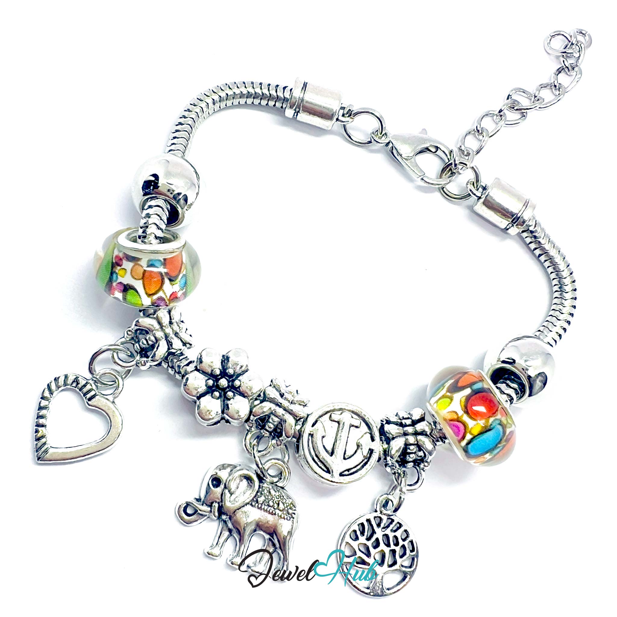 Silver bracelet with various charms on a white background