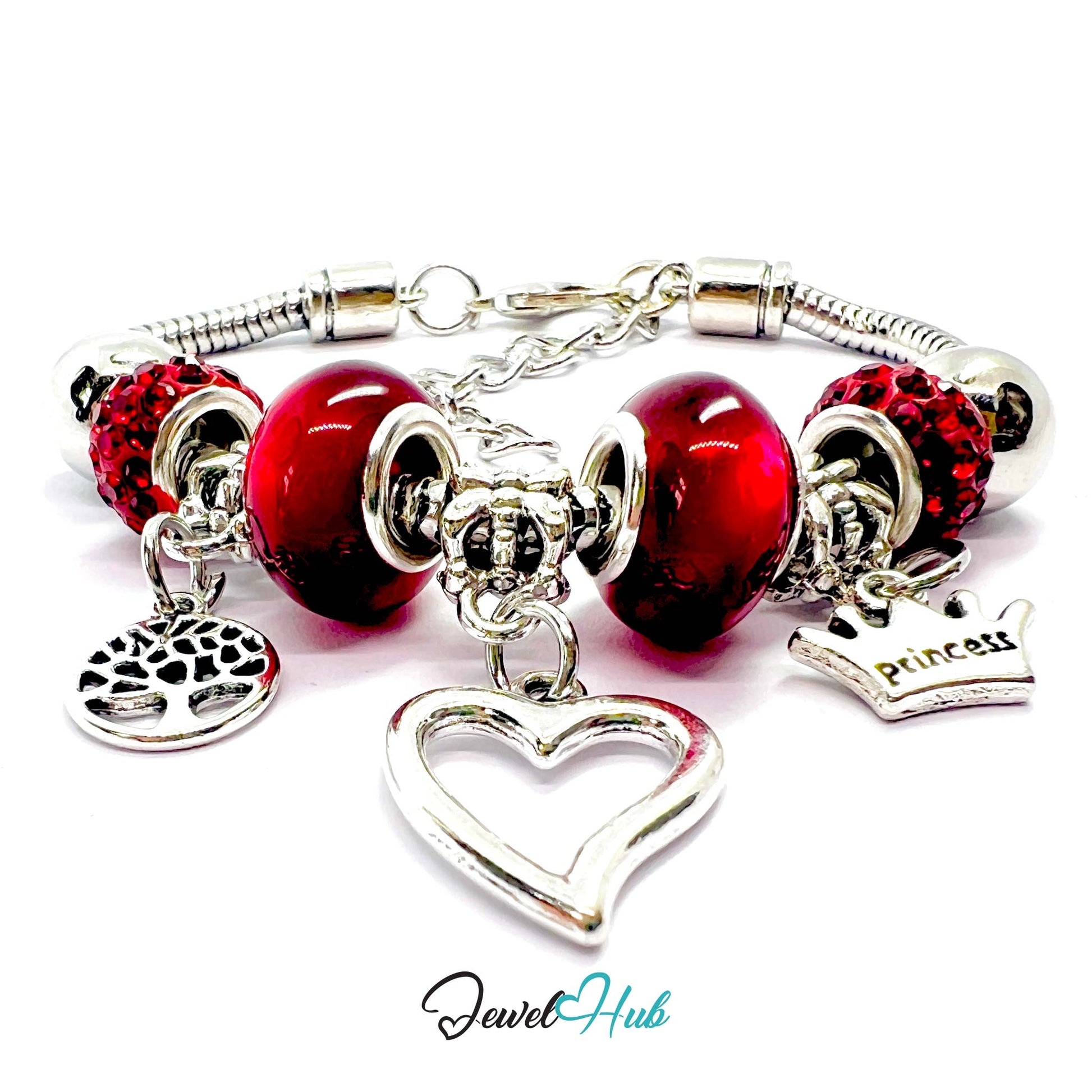 Silver bracelet with red beads and charms on a white background, featuring 'Jewel Hub' branding.