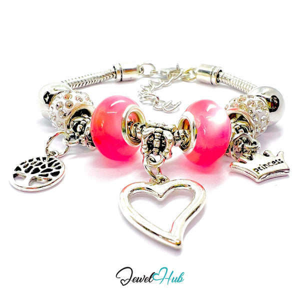 Silver bracelet with pink beads and charms on a white background, branded 'Jewel Hub'.