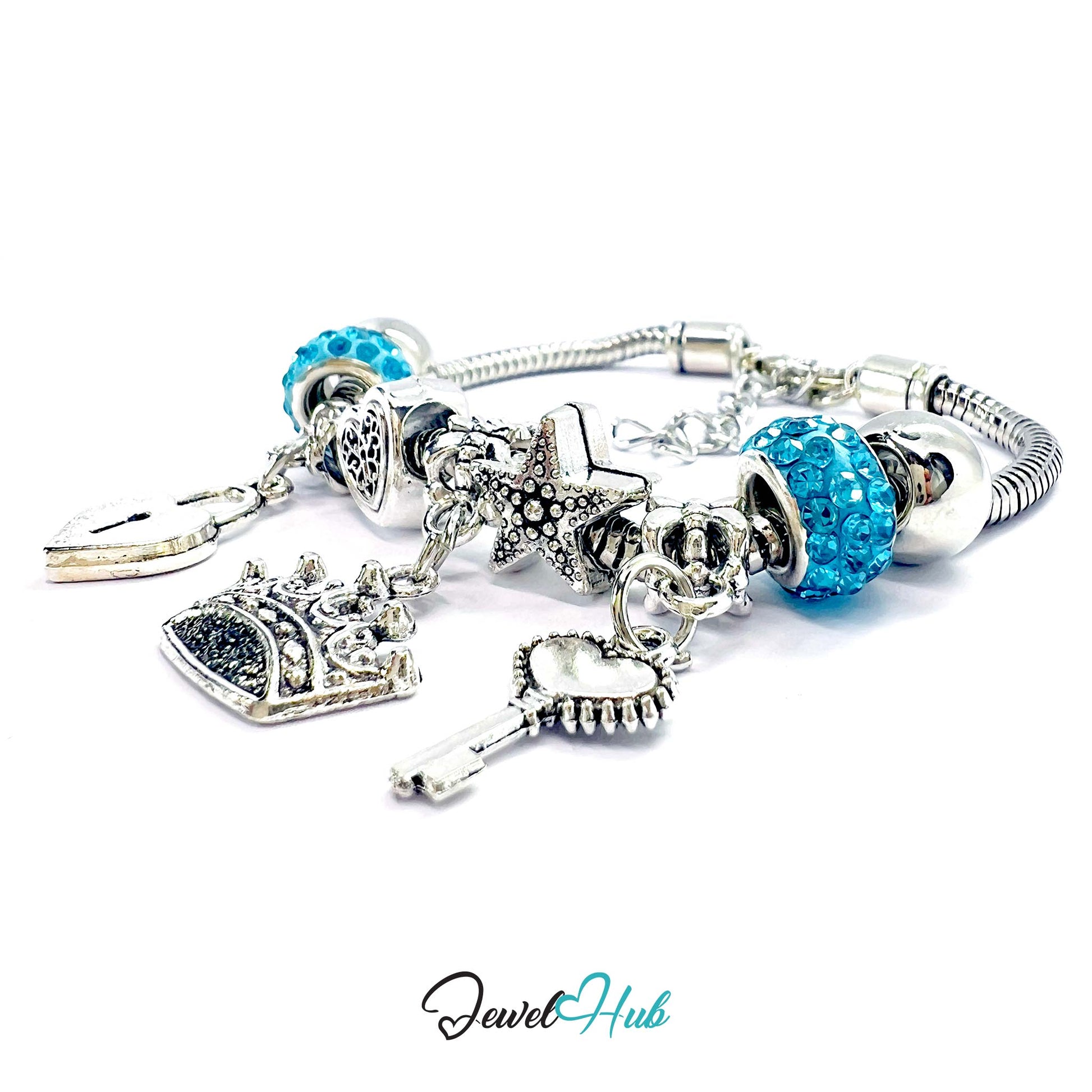 Silver charm bracelet with blue beads and various charms on a white background, branded 'Jewel Hub'.