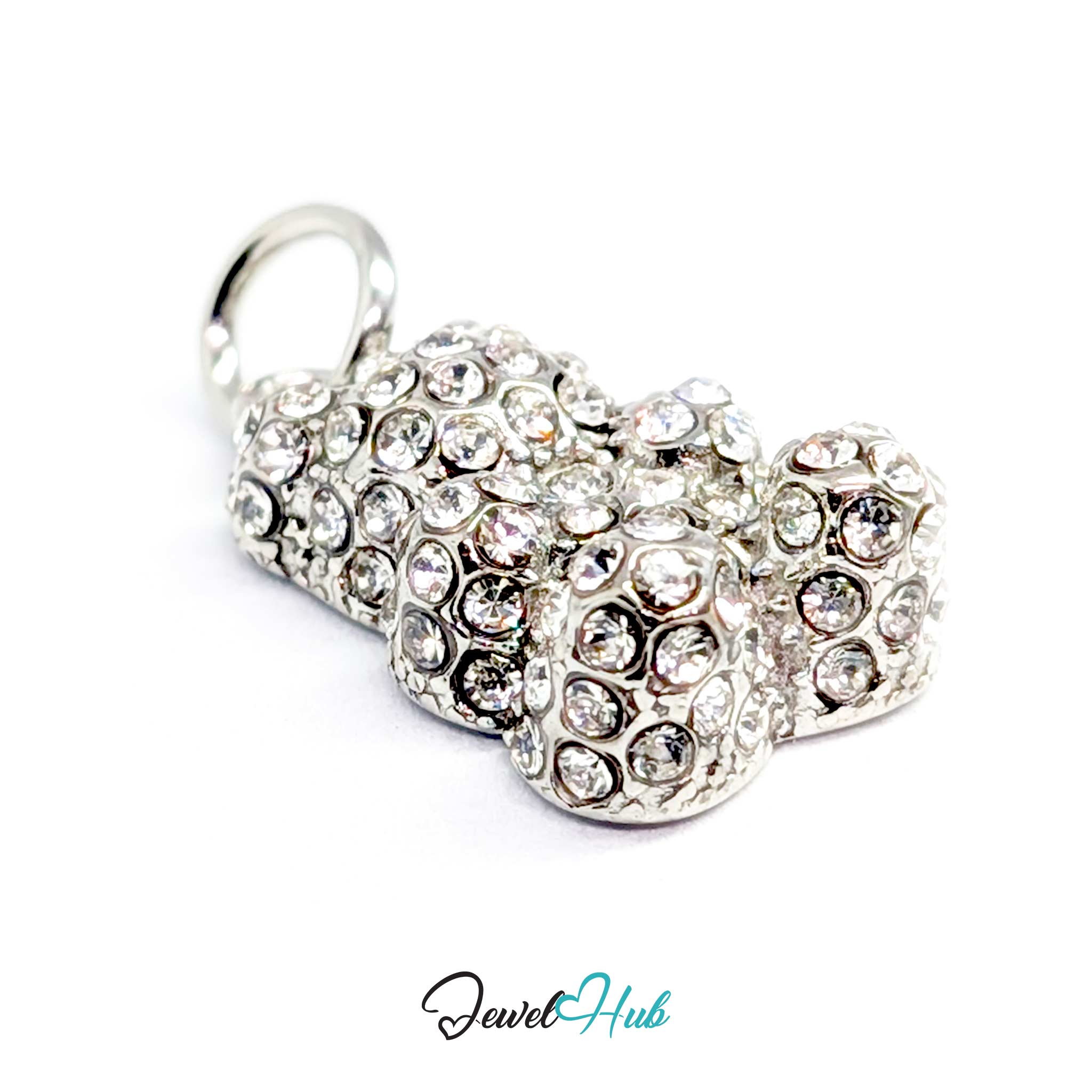 A silver-tone charm shaped like a small bear cub, covered in clear rhinestones, with a hanging loop at the top, shown on a white background with a JewelHub watermark.