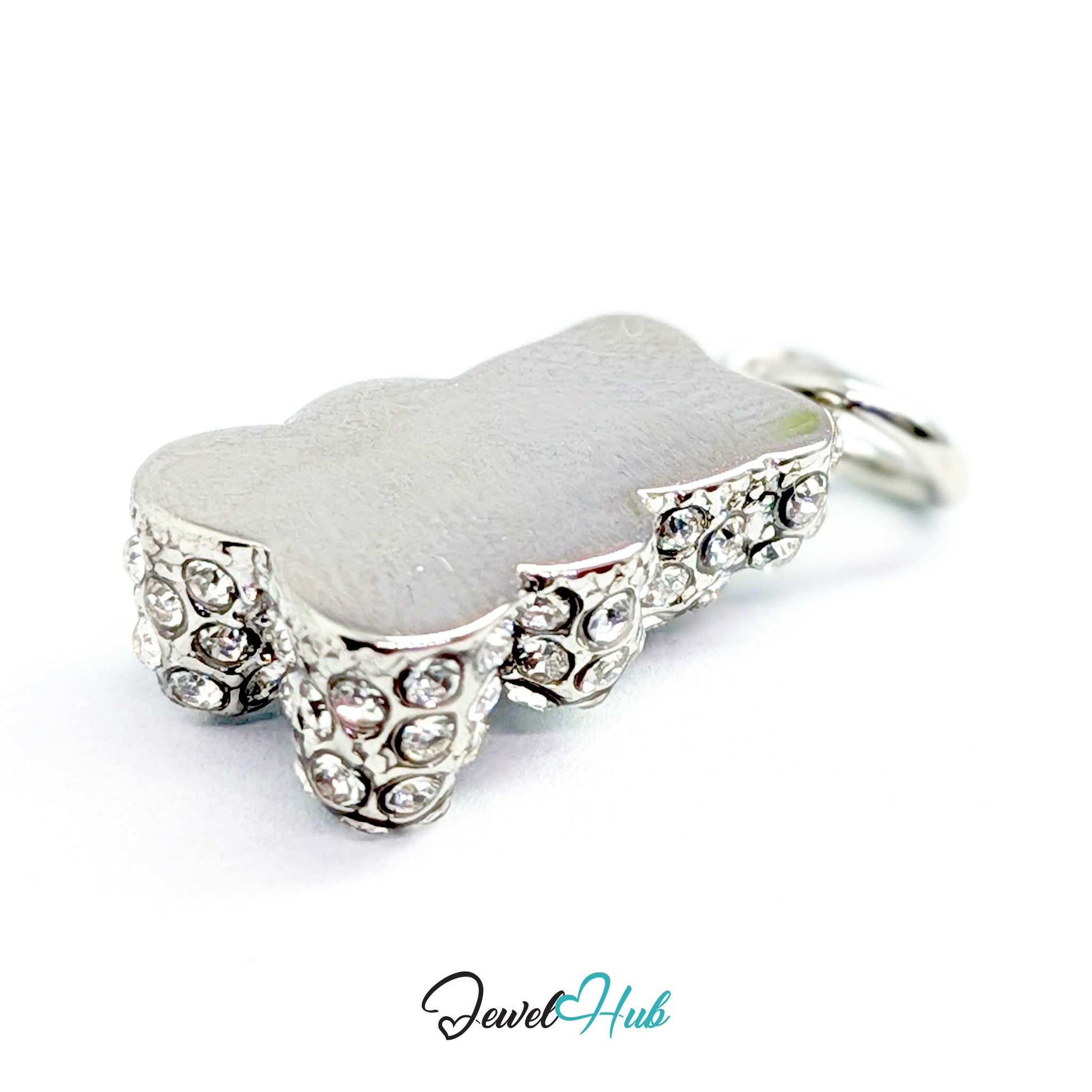 A silver-toned tooth-shaped pendant charm with a frosted white center and clear rhinestone accents on the sides, shown on a white background with a JewelryHub watermark.