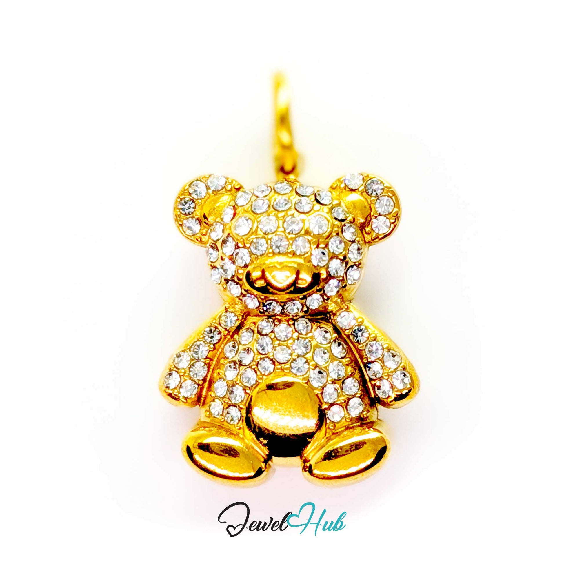 A gold teddy bear pendant encrusted with clear rhinestones, shown against a plain white background with a 'JewelHub' watermark at the bottom.