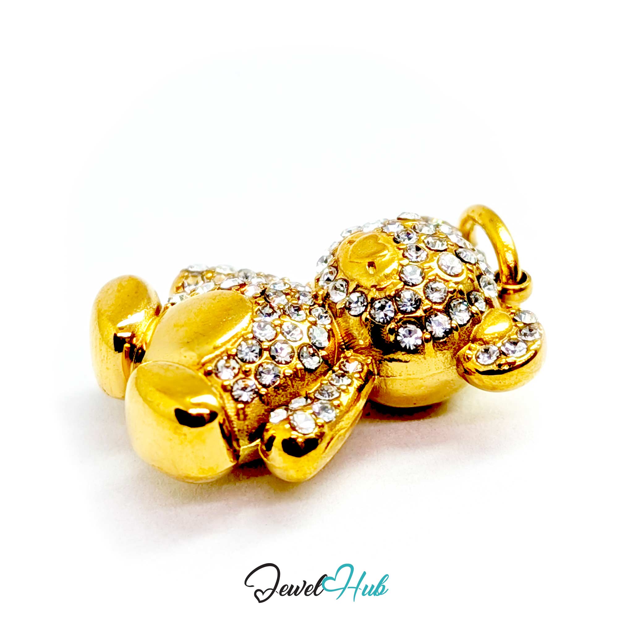 A gold teddy bear charm embellished with clear rhinestones, shown on a plain white background with a 'JewelHub' watermark at the bottom.