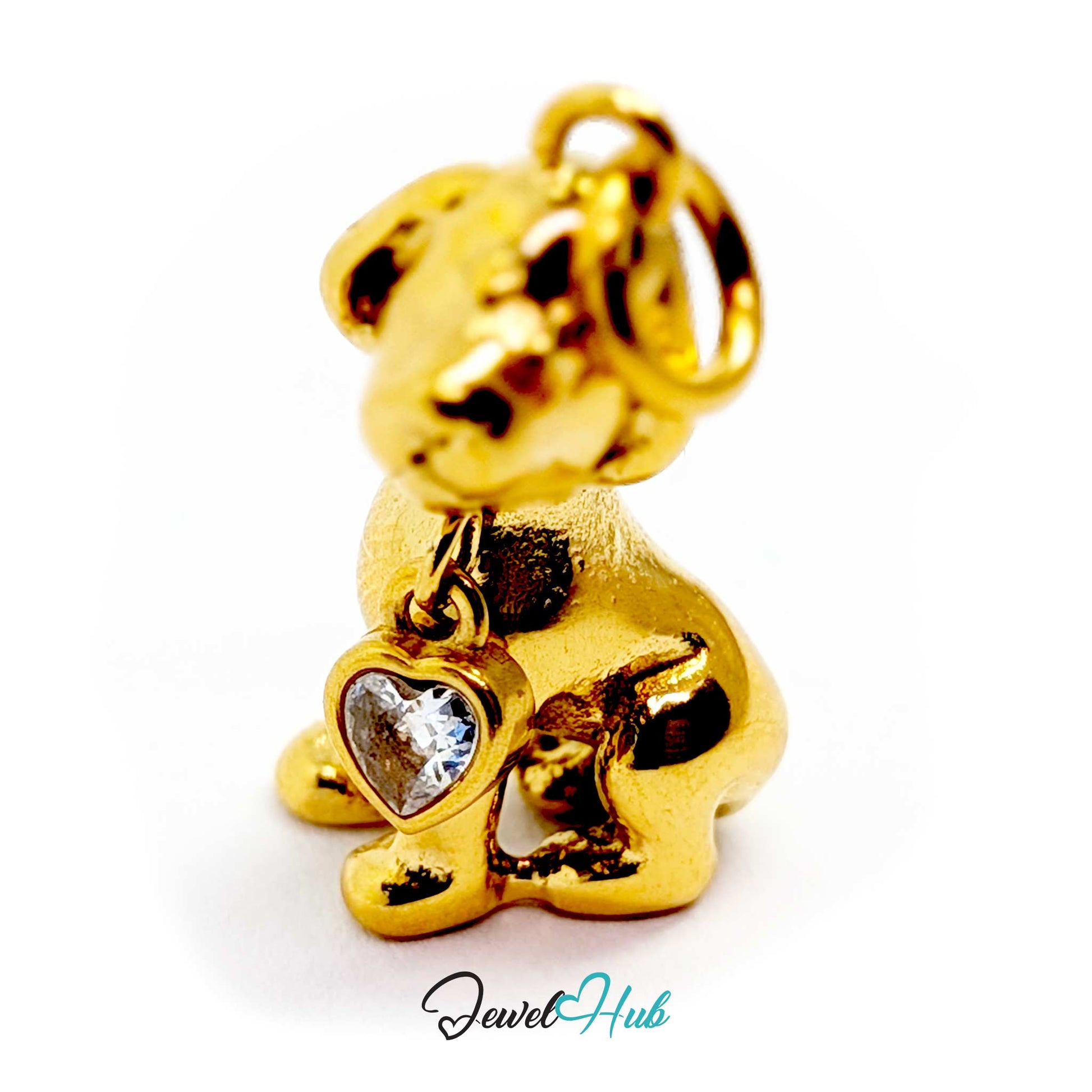 Gold sitting puppy charm from the front, showing the bezel-set heart crystal at its chest - JewelHub
