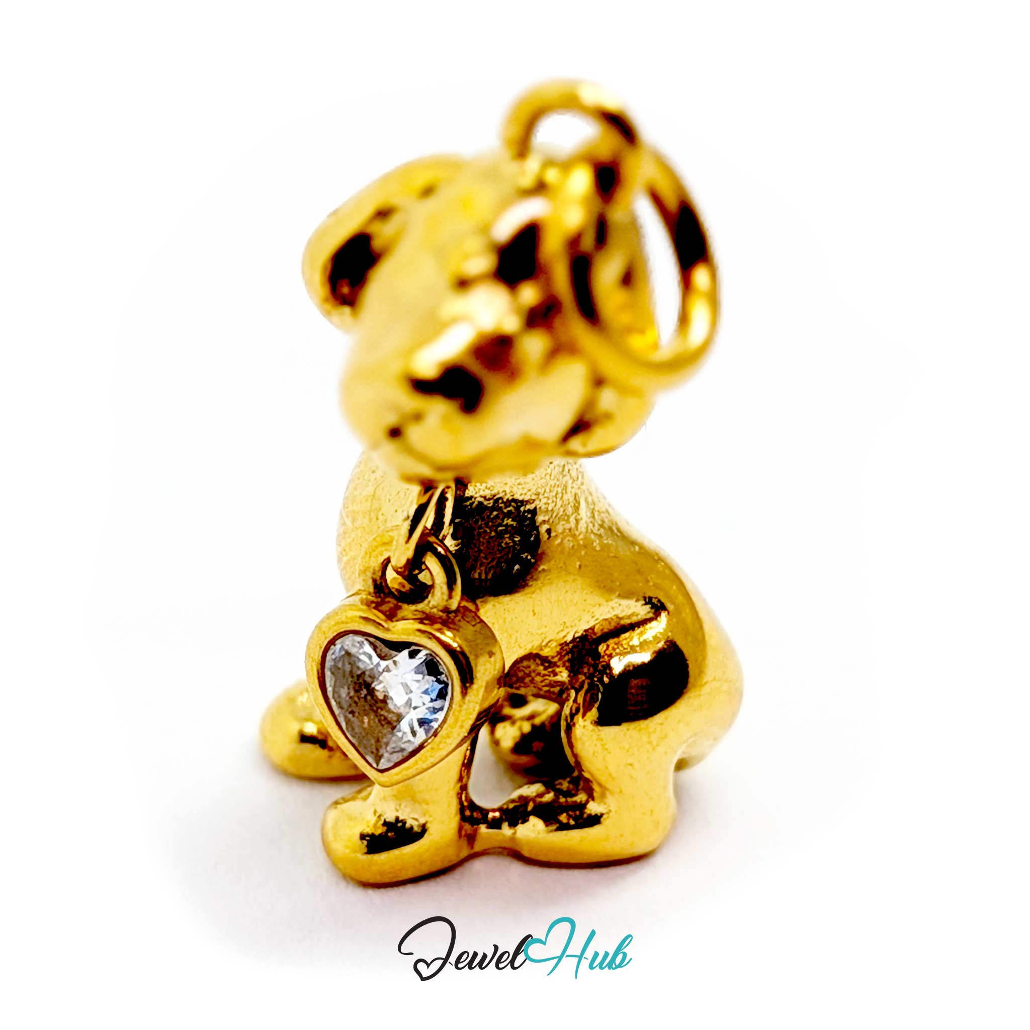 Gold sitting puppy charm from the front, showing the bezel-set heart crystal at its chest - JewelHub