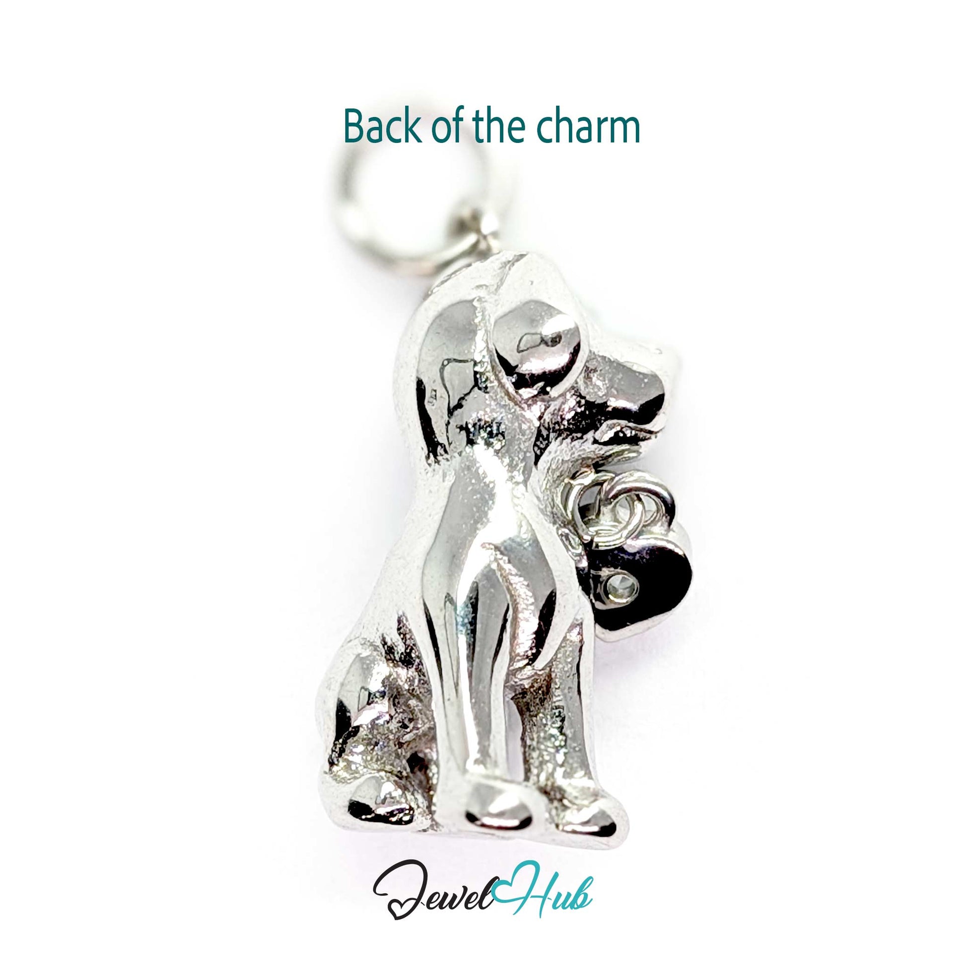 Back of the silver sitting puppy charm - sculpted in the round with no flat panel - JewelHub