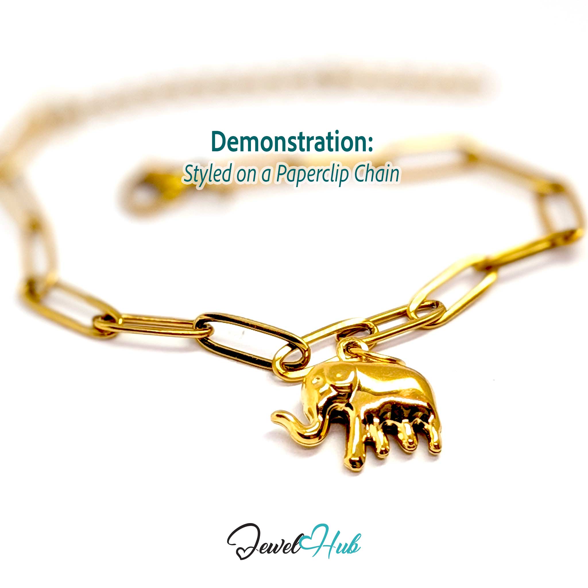 Gold elephant charm styled on a gold paperclip chain bracelet - JewelHub
