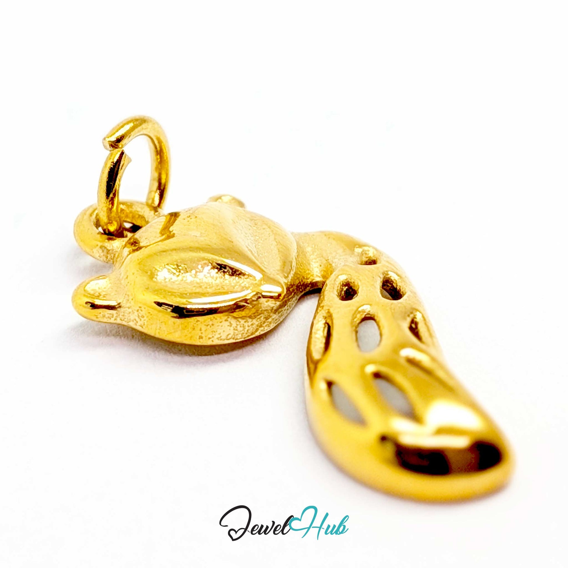 Gold fox charm laid flat to show the oval cut-outs running down the tail - JewelHub