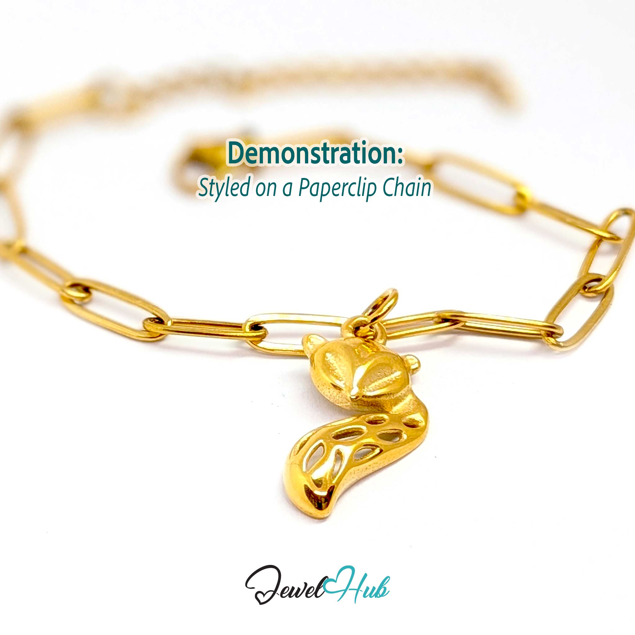 Gold fox charm styled on a gold paperclip chain bracelet - JewelHub