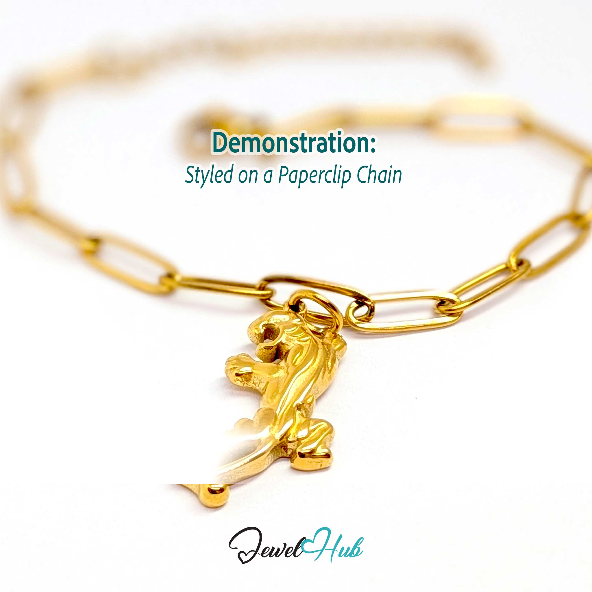 Gold tiger charm styled on a gold paperclip chain bracelet - JewelHub