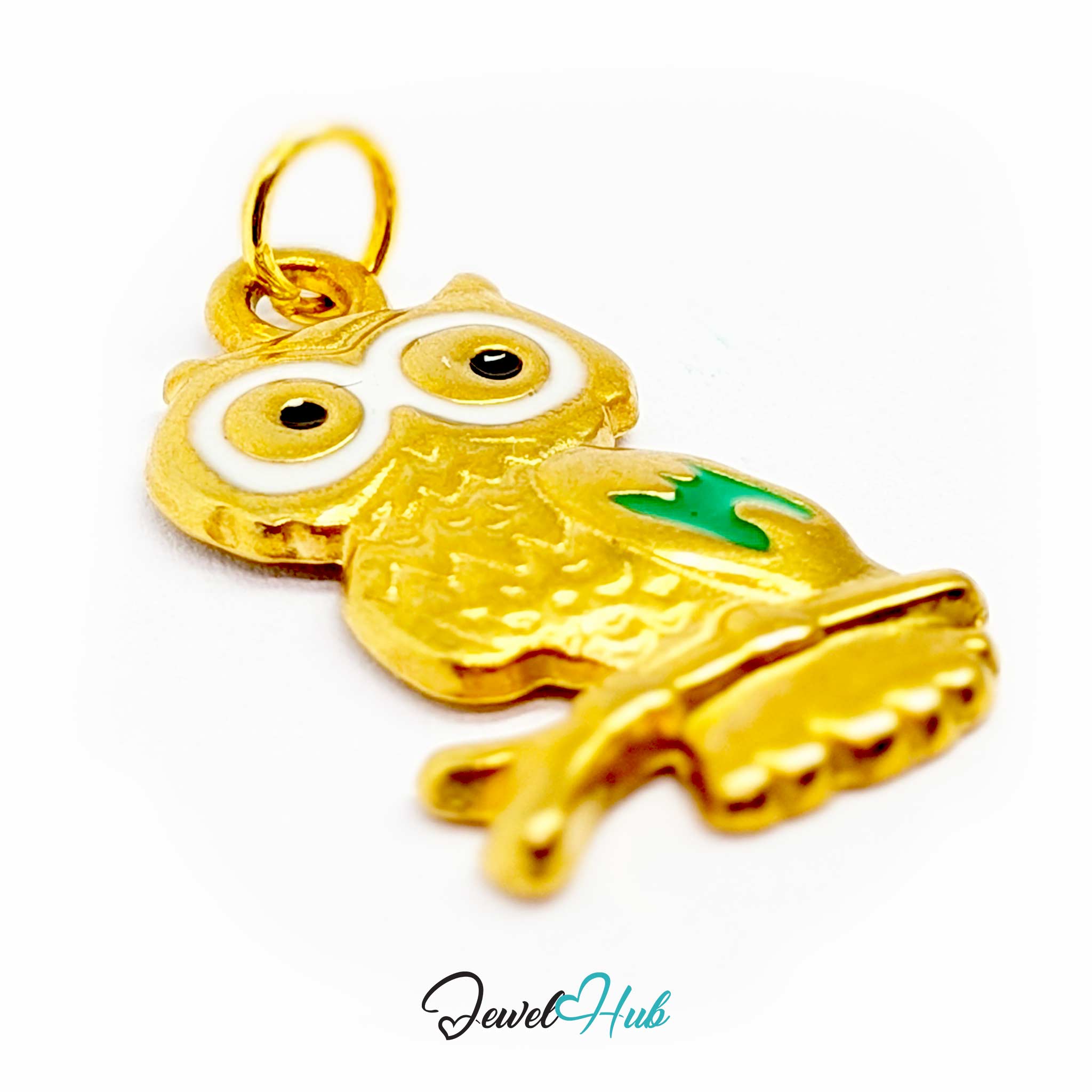 Gold owl charm angled to show the scalloped breast feathers and branch - JewelHub