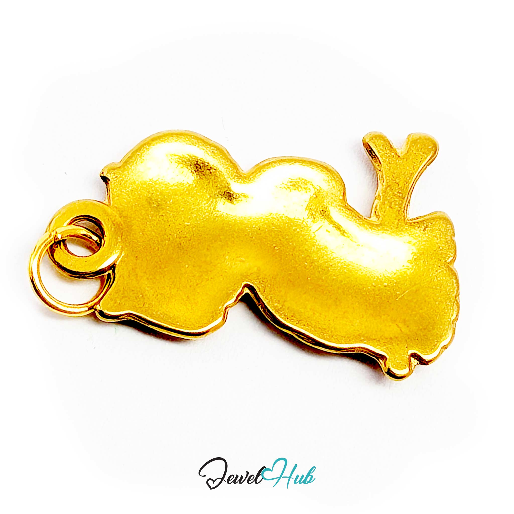 Gold owl charm laid on its side to show its slim 1.8mm depth - JewelHub