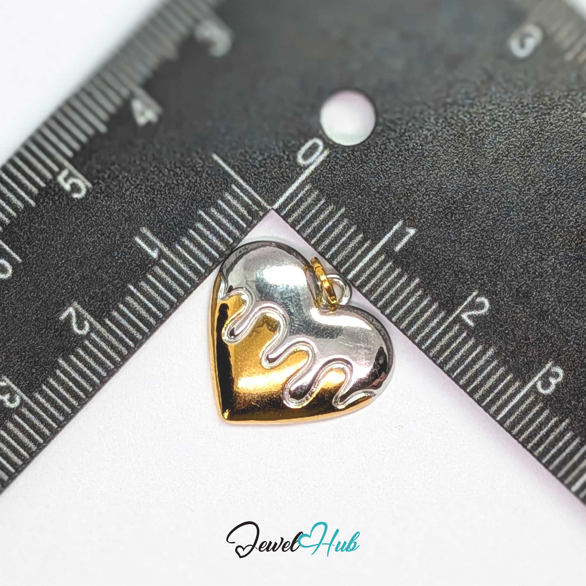 Drip Heart charm, two-tone stainless steel, measured against a ruler at 20 x 18.3mm - JewelHub