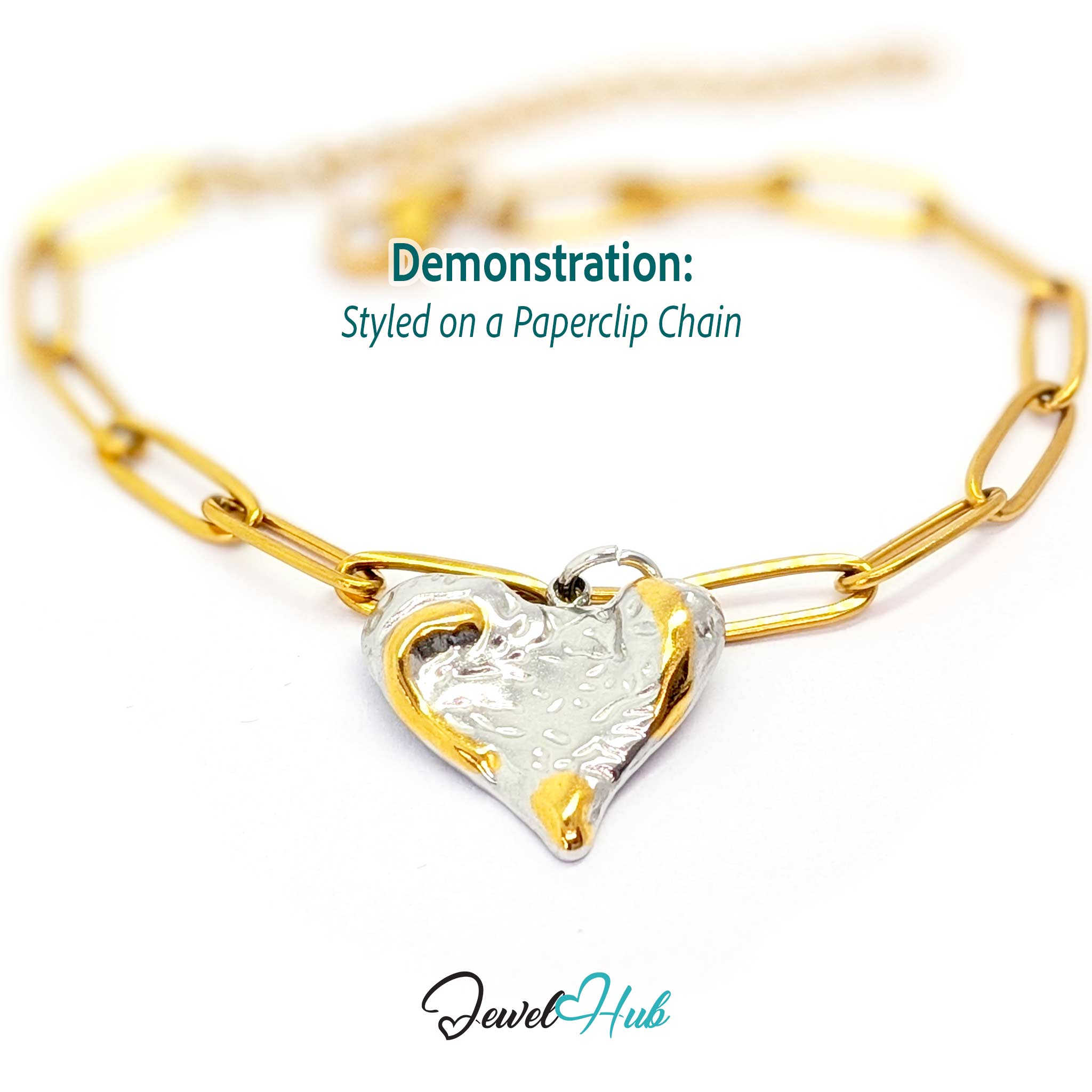 Textured Heart charm, two-tone stainless steel, styled on a gold paperclip chain bracelet - JewelHub