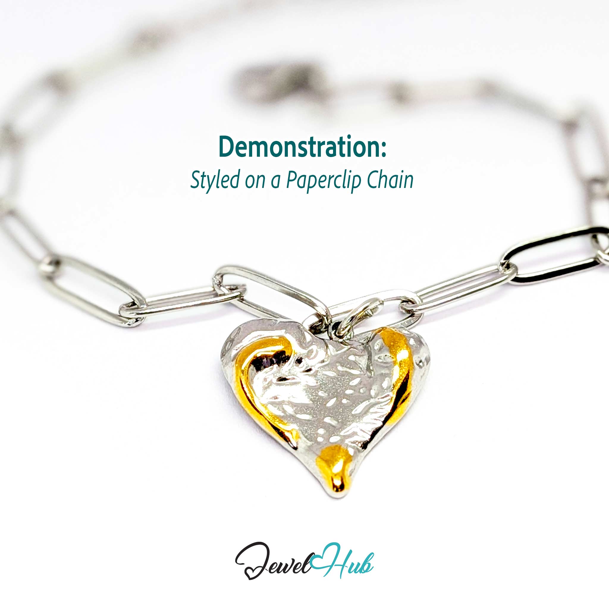 Textured Heart charm, two-tone stainless steel, styled on a silver paperclip chain bracelet - JewelHub