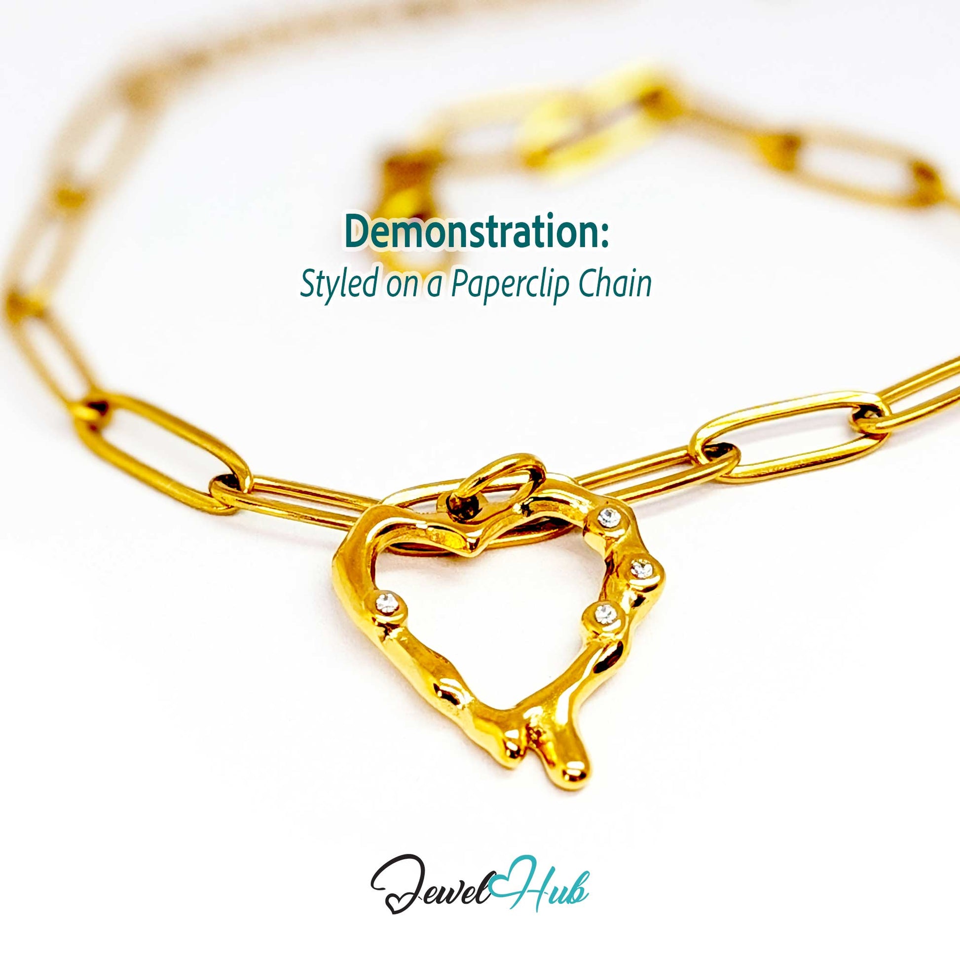 Outline Heart charm, gold stainless steel, styled on a gold paperclip chain bracelet - JewelHub