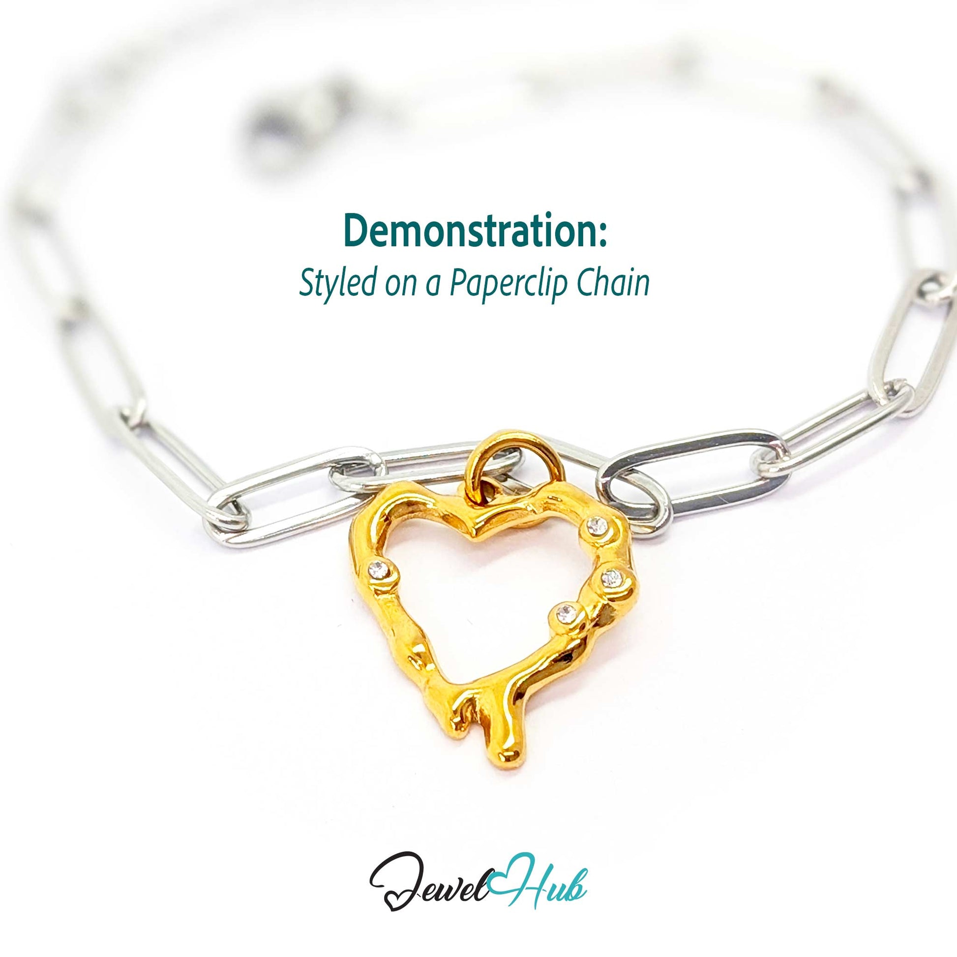 Outline Heart charm, gold stainless steel, styled on a silver paperclip chain bracelet - JewelHub