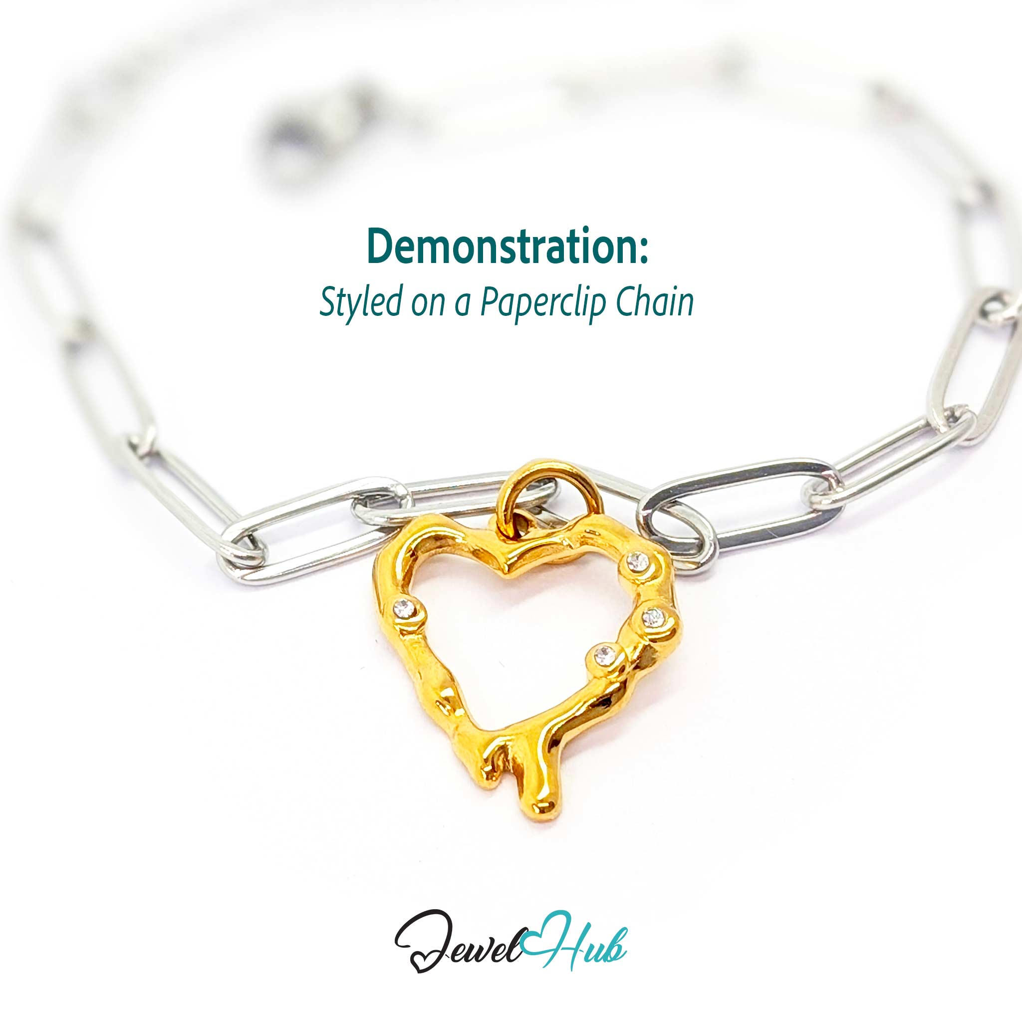 Outline Heart charm, gold stainless steel, styled on a silver paperclip chain bracelet - JewelHub