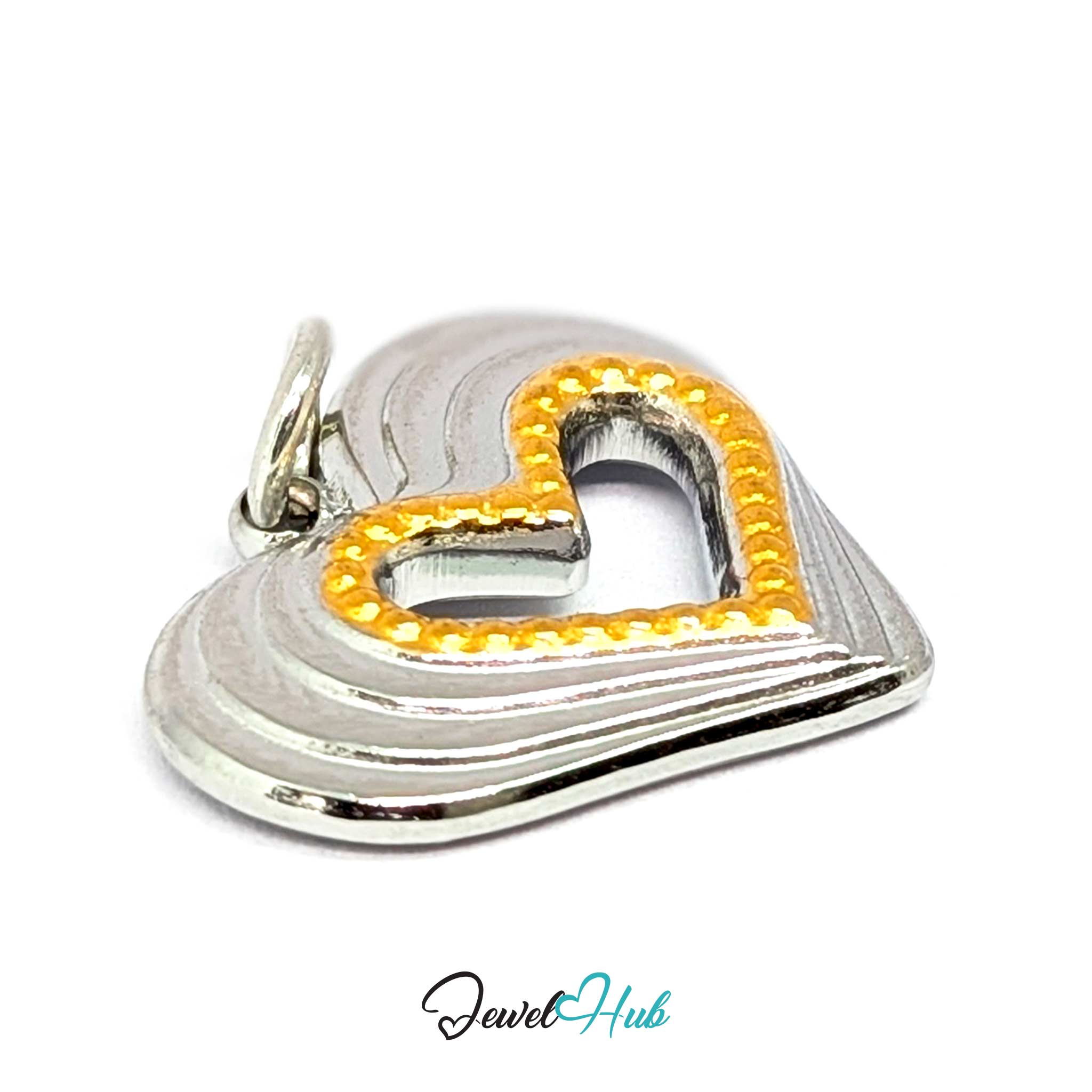 Hollow Heart charm tilted, two-tone stainless steel - the stepped ridges and gold beading - JewelHub