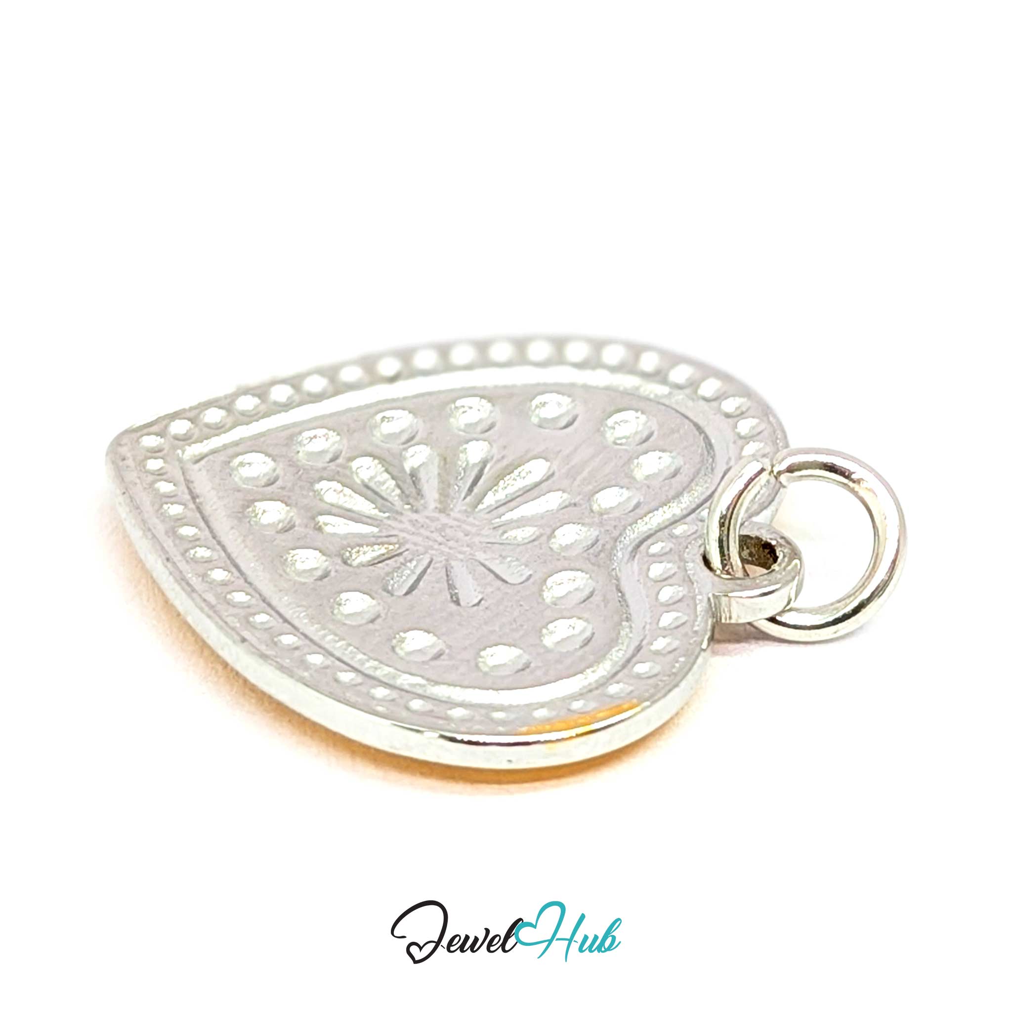 Starburst Heart charm, two-tone stainless steel - turned to the patterned silver reverse - JewelHub