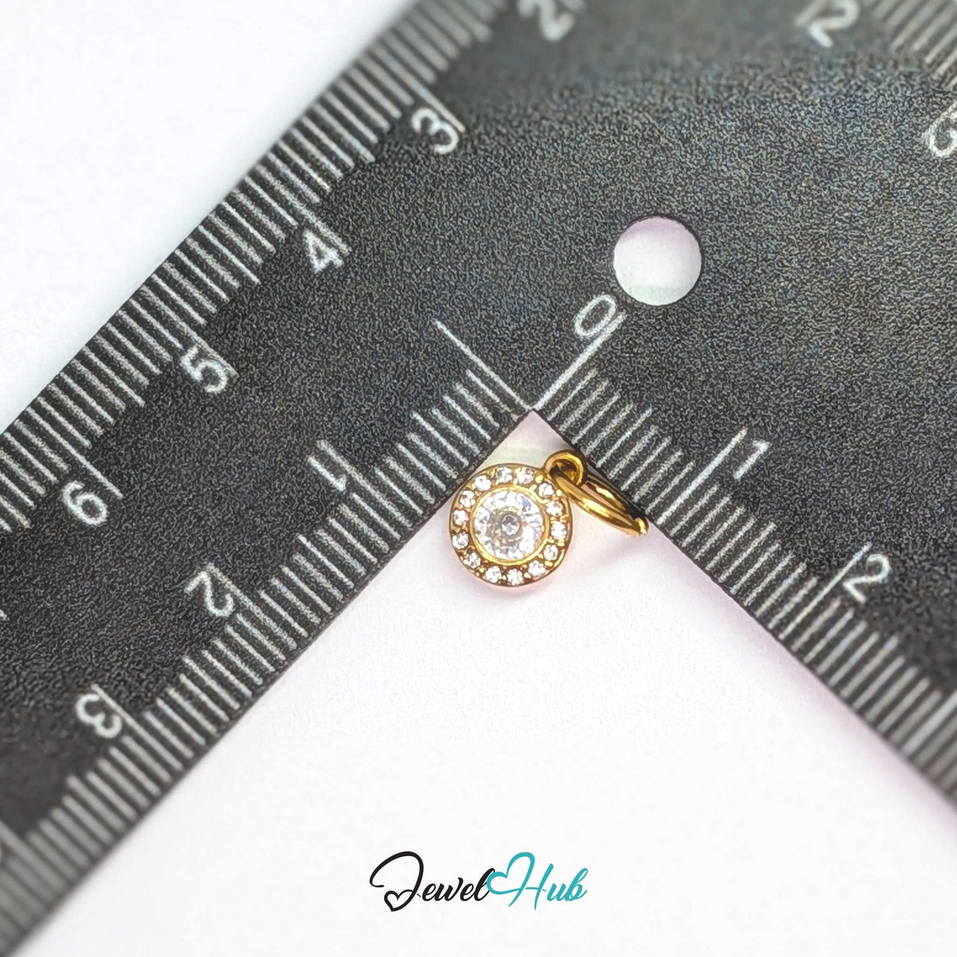 Halo Round charm, gold stainless steel, measured against a ruler at 7.5 x 9.5mm - JewelHub