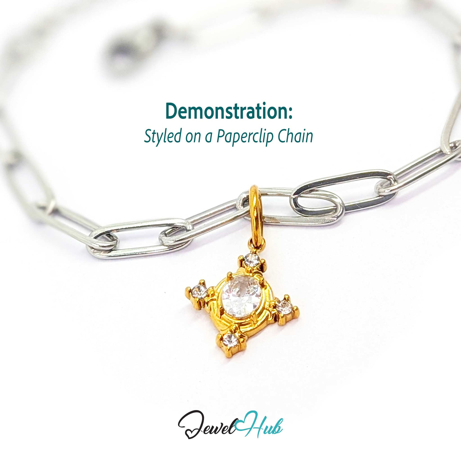 Gem Star charm, gold stainless steel, styled on a silver paperclip chain bracelet - JewelHub