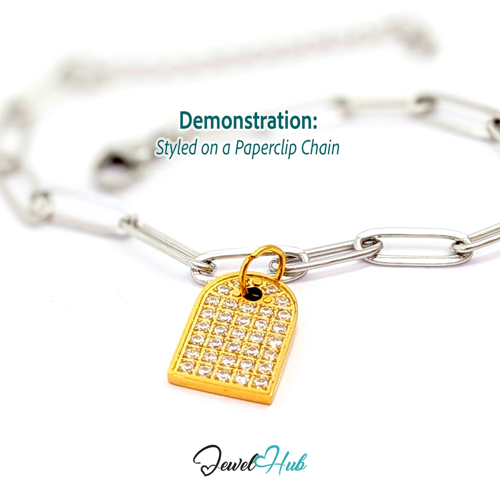 Pave Arch charm, gold stainless steel, styled on a silver paperclip chain bracelet - JewelHub