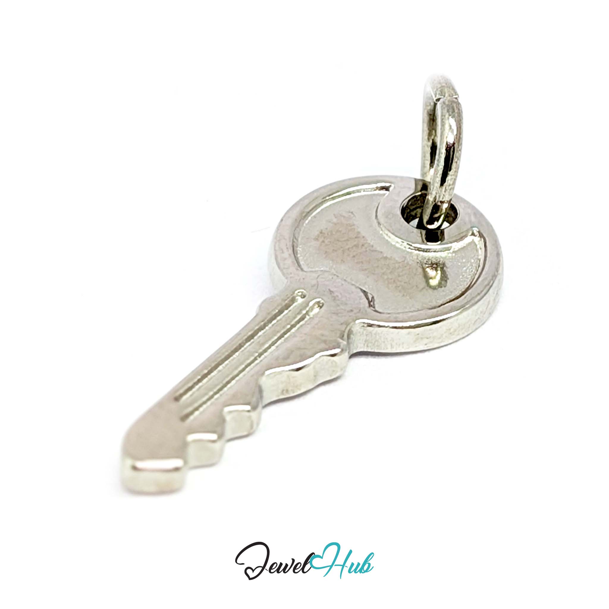 Everyday key charm in silver stainless steel with a plain round head - angled view - JewelHub