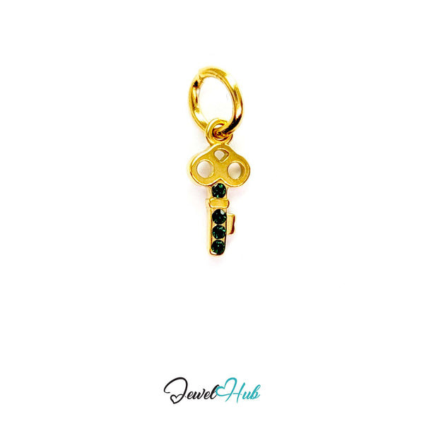 Mini key charm in gold stainless steel with four green stones - front view - JewelHub