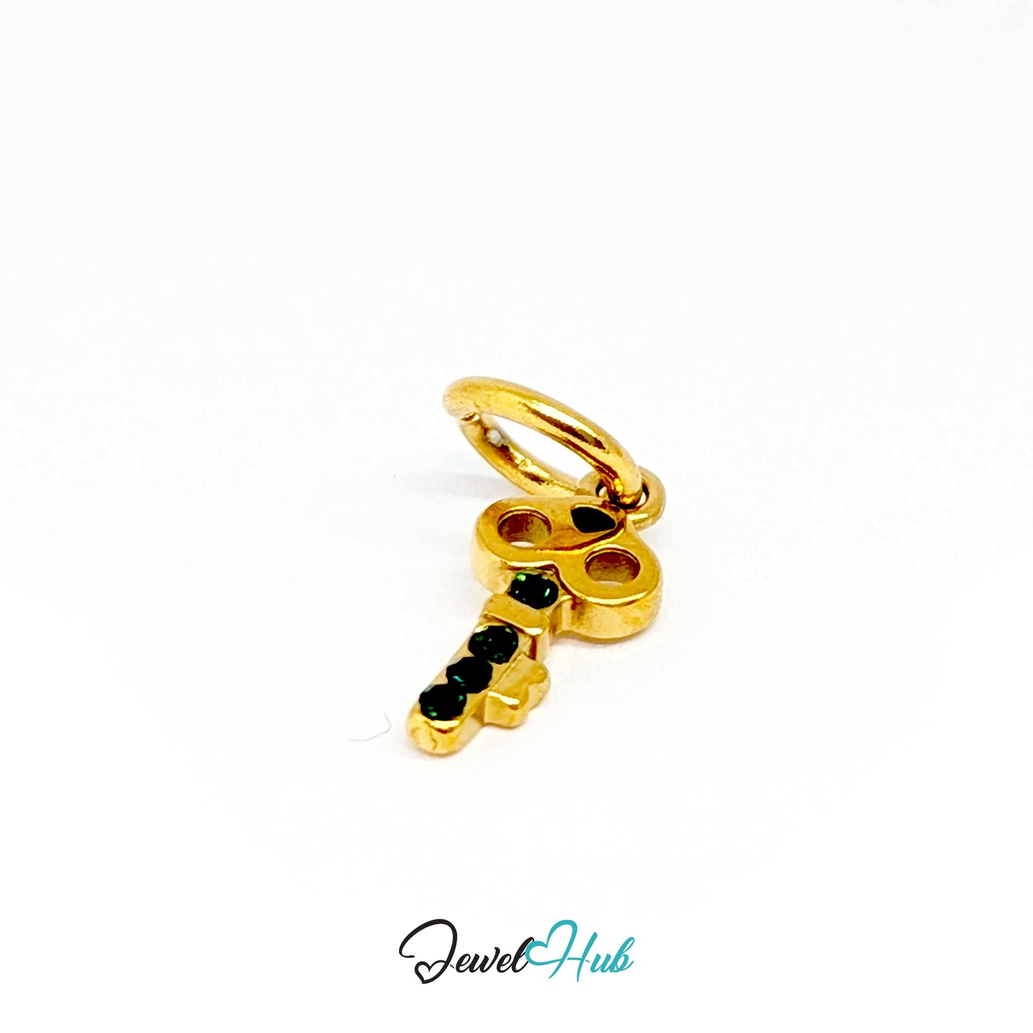 Mini key charm in gold stainless steel with four green stones - three-quarter view - JewelHub