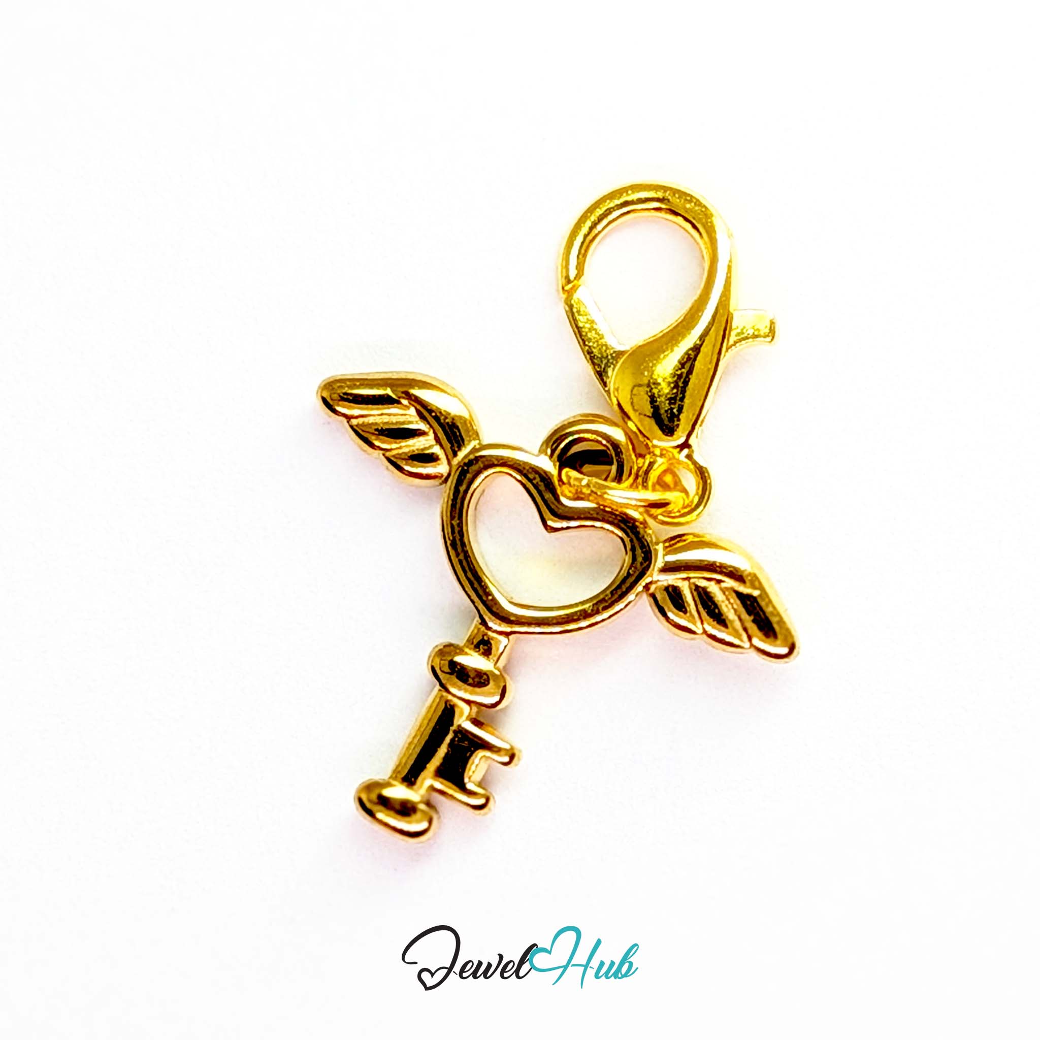 Winged heart key charm in gold stainless steel - shown with the lobster clasp attached - JewelHub